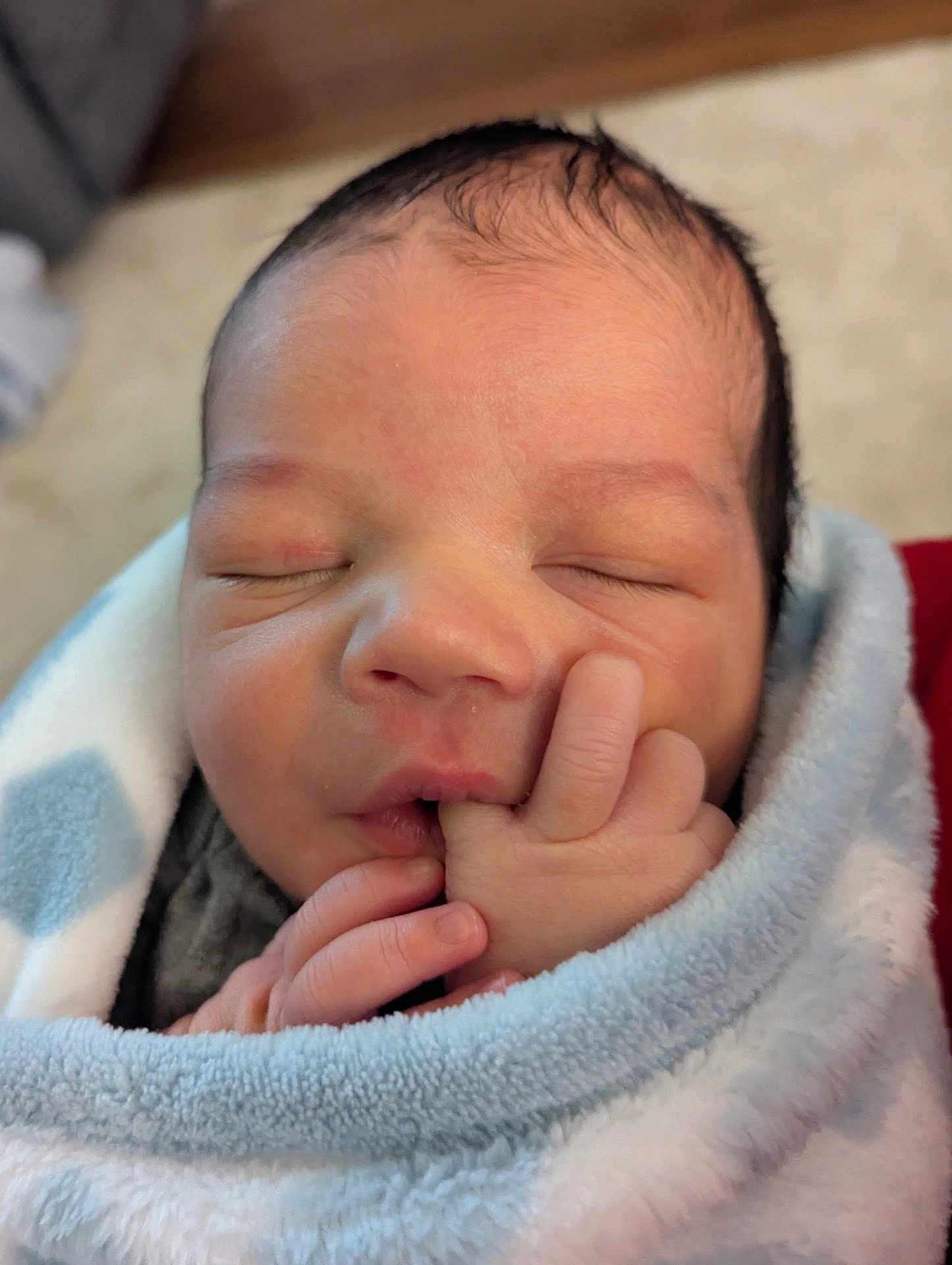Ezekiel joined the competition — help win amazing prizes! newborn, baby, infant, sleeping, blanket, wrapped, cute, face, hand, fingers, skin, closeup, soft, cozy, peaceful, indoors, portrait, child, young, resting