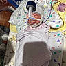 newborn, baby, hospital, medical_equipment, blanket, swaddled, face, hat, pacifier, tube, heart_pattern, bed, resting, infant, cute, sleeping, healthcare, child, patient, care