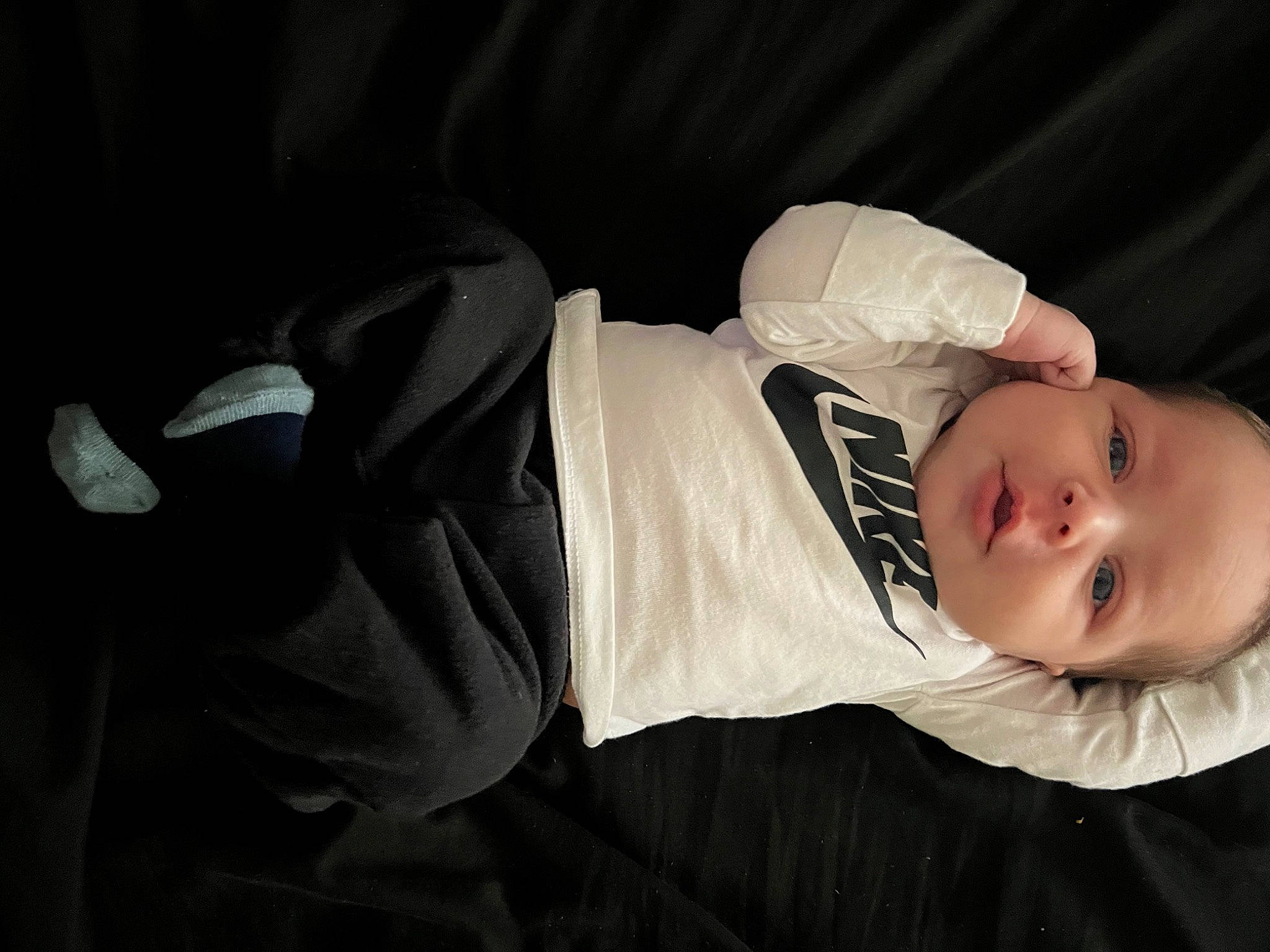 Maverick is registered to the contest to win money with this photo: baby, baby_toddler_clothing, cheek, child, collar, comfort, darkness, eye, flash_photography, hat, monochrome, monochrome_photography, person, photo_shoot, portrait, portrait_photography, room, sitting, sleeve, toddler