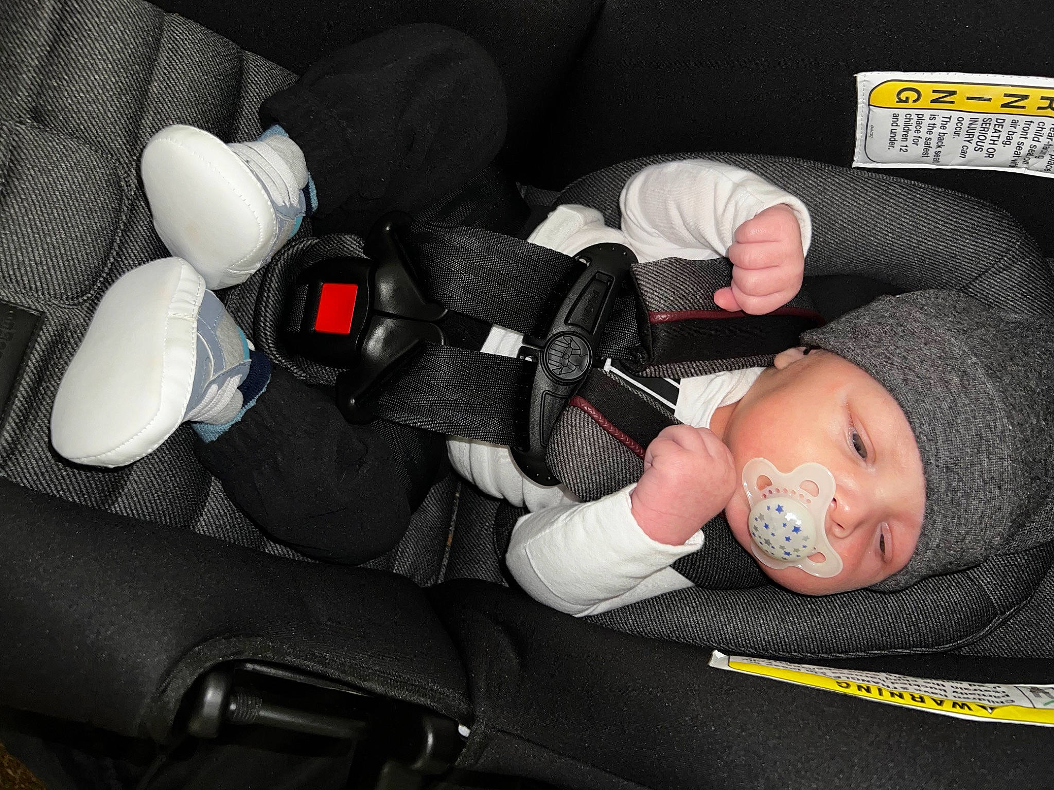 Maverick is registered to the contest to win money with this photo: arm, auto_part, automotive_design, baby, baby_carriage, baby_in_car_seat, baby_products, baby_toddler_clothing, car_seat, car_seat_cover, comfort, finger, hand, headwear, human_body, motor_vehicle, nail, person, steering_part, steering_wheel