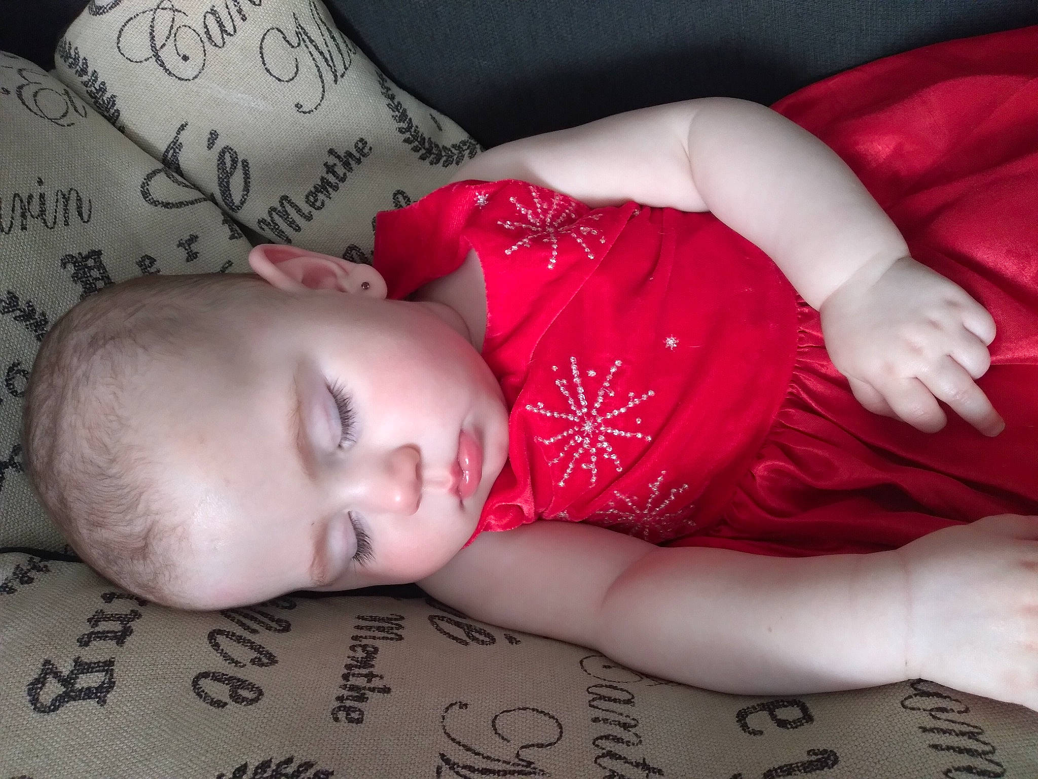 Genevieve is registered to the contest to win money with this photo: arm, baby, cheek, comfort, eyelash, finger, flash_photography, hand, human, human_body, lip, mouth, muscle, organ, person, pink, skin, sleeve, textile, toddler