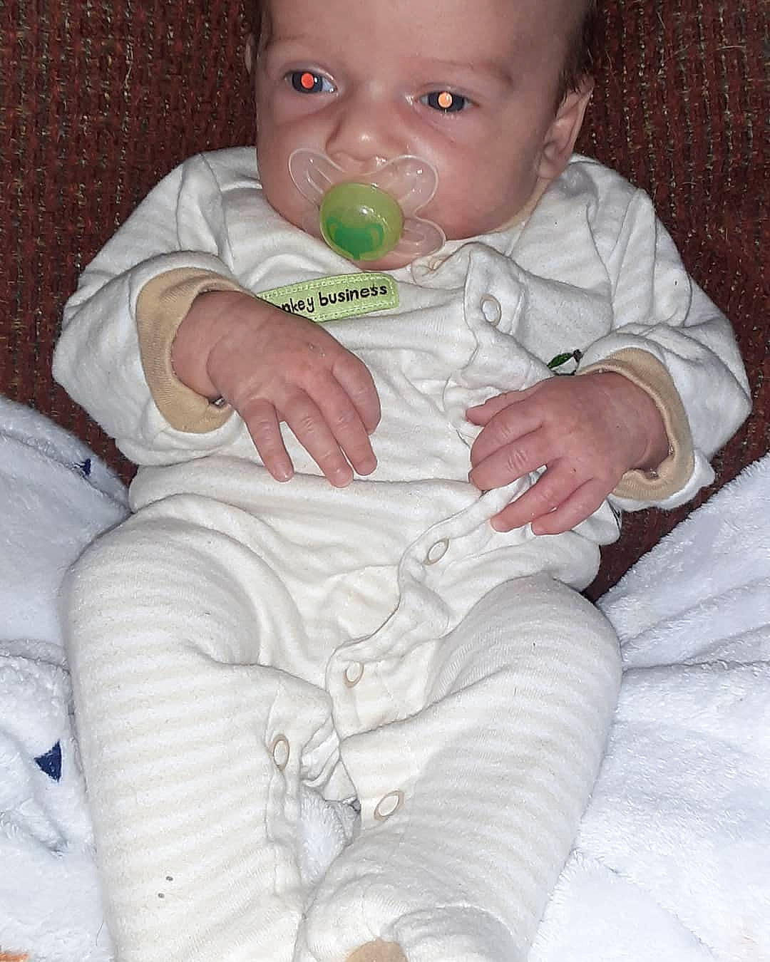 Lea joined the competition — help win amazing prizes! baby, baby_products, baby_toddler_clothing, cheek, child, comfort, finger, foot, hand, human, human_body, linens, mammal, nail, person, product, sitting, skin, sock, toddler