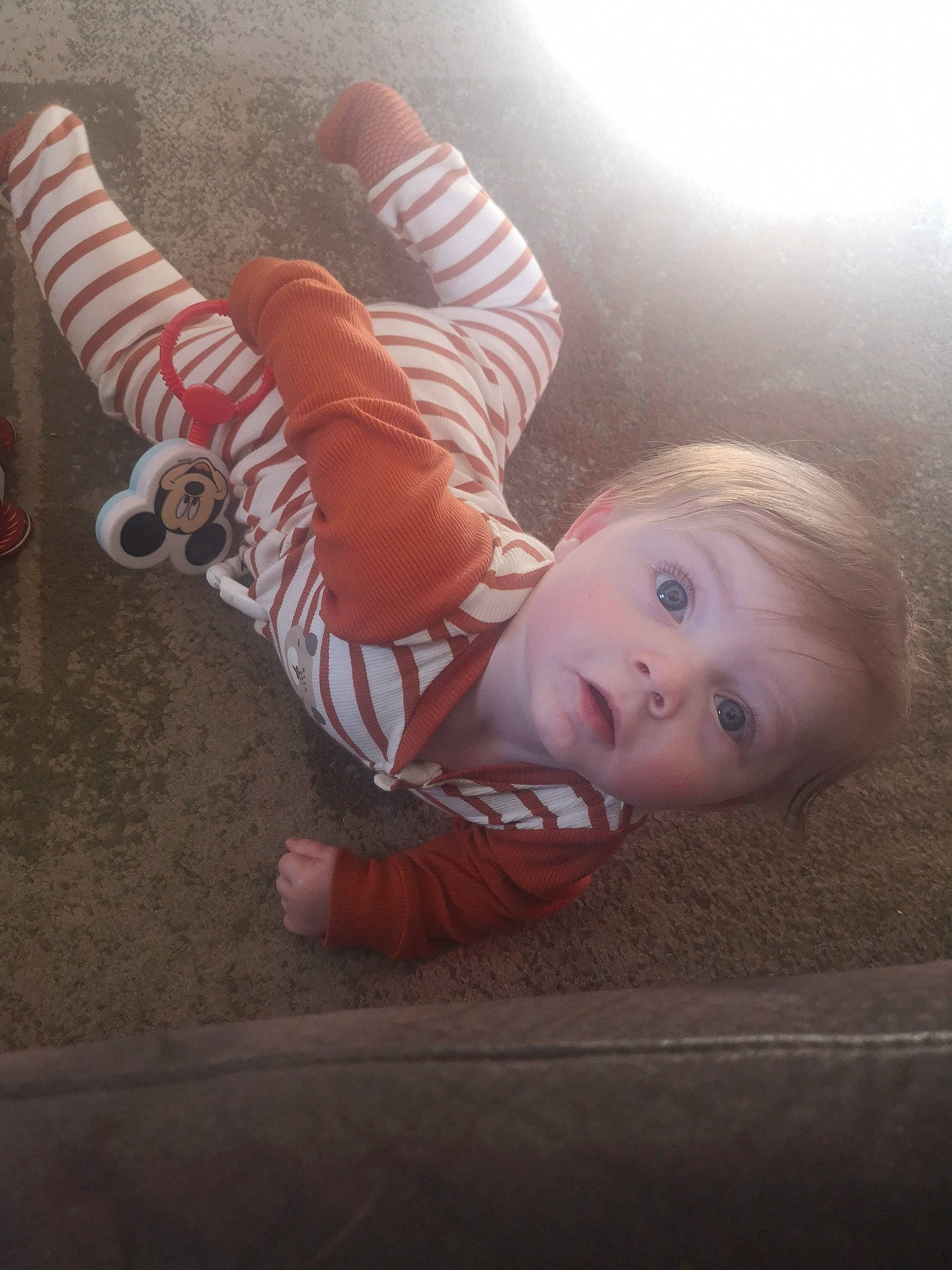 Bentley joined the competition — help win amazing prizes! baby, baby_toddler_clothing, carmine, child, comfort, flash_photography, flooring, fun, happy, human_body, human_leg, knee, pattern, person, sitting, sleeve, smile, sock, thigh, toddler