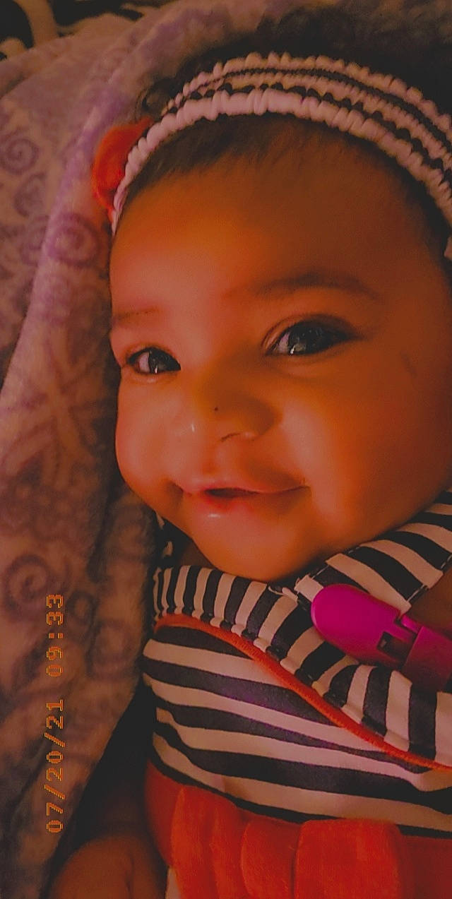 Legacy is registered to the contest to win money with this photo: baby, cheek, chin, ear, eye, eyebrow, eyelash, face, facial_expression, forehead, head, iris, lip, mammal, mouth, neck, nose, organ, person, skin