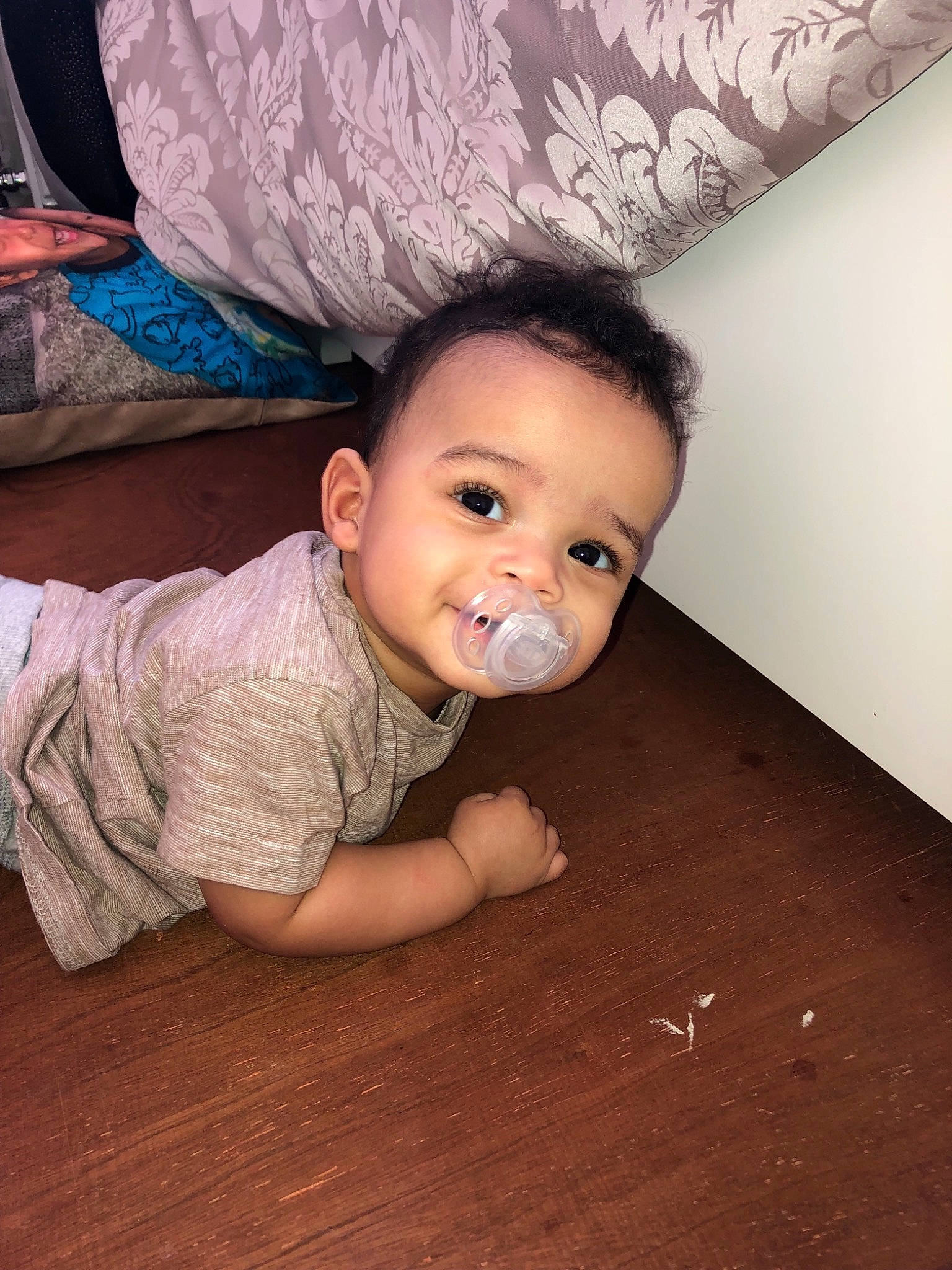 Hudson-george Mullings is registered to the contest to win money with this photo: baby, cheek, child, crawling, eye, face, floor, flooring, head, joy, mouth, nose, person, skin, toddler, wood