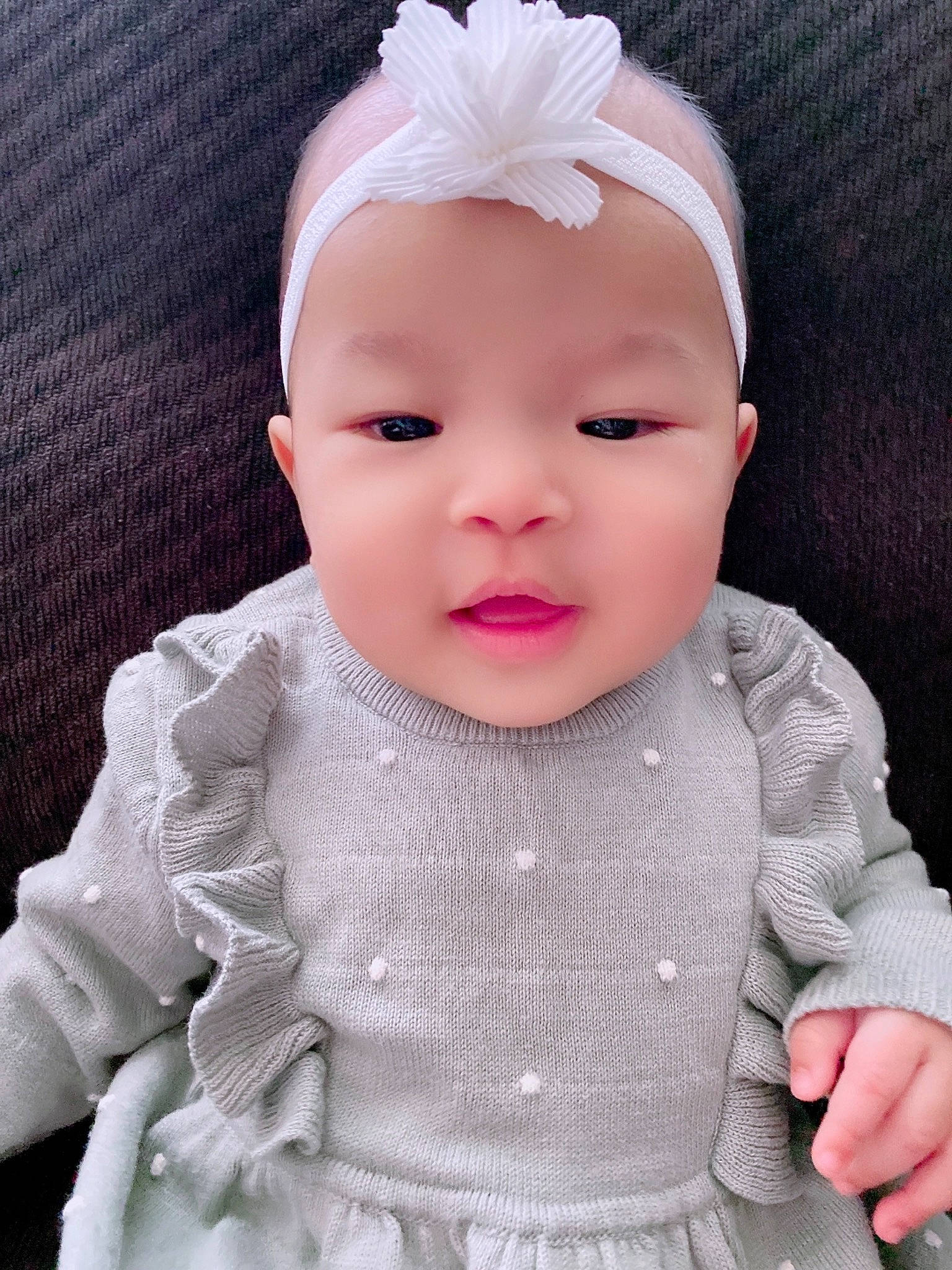 Avalee joined the competition — help win amazing prizes! baby, baby_toddler_clothing, cap, cheek, chin, dress, ear, eye, eyelash, face, head, headwear, human_body, iris, lip, neck, nose, person, skin, sleeve