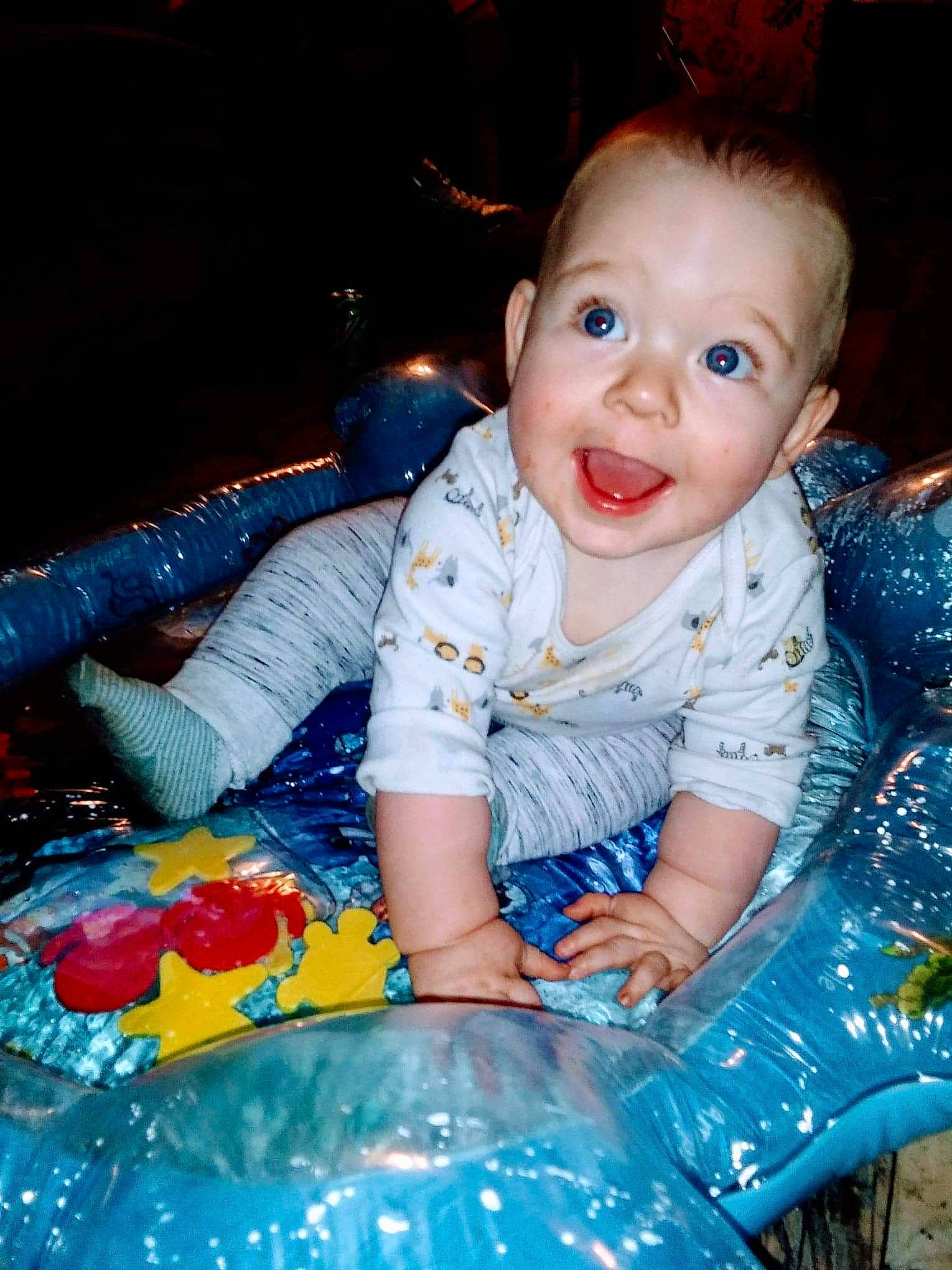 Jasper joined the competition — help win amazing prizes! baby, baby_toddler_clothing, blue, child, electric_blue, event, facial_expression, flash_photography, flooring, fun, happy, iris, leisure, organ, person, play, recreation, sitting, smile, toddler