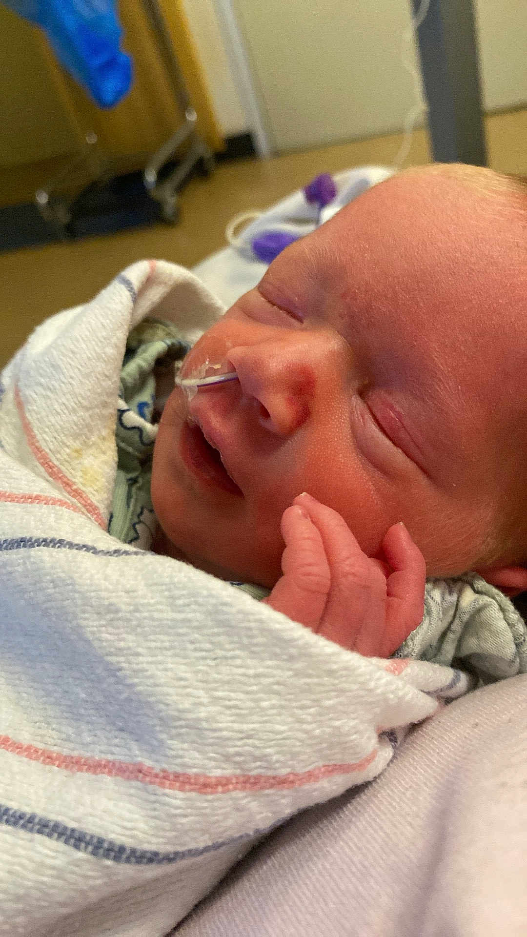 Madelyn joined the competition — help win amazing prizes! newborn, baby, infant, hospital, blanket, swaddled, feeding_tube, face, hand, sleeping, skin, closeup, medicine, patient, healthcare, cute, fragile, early_life, portrait, indoors