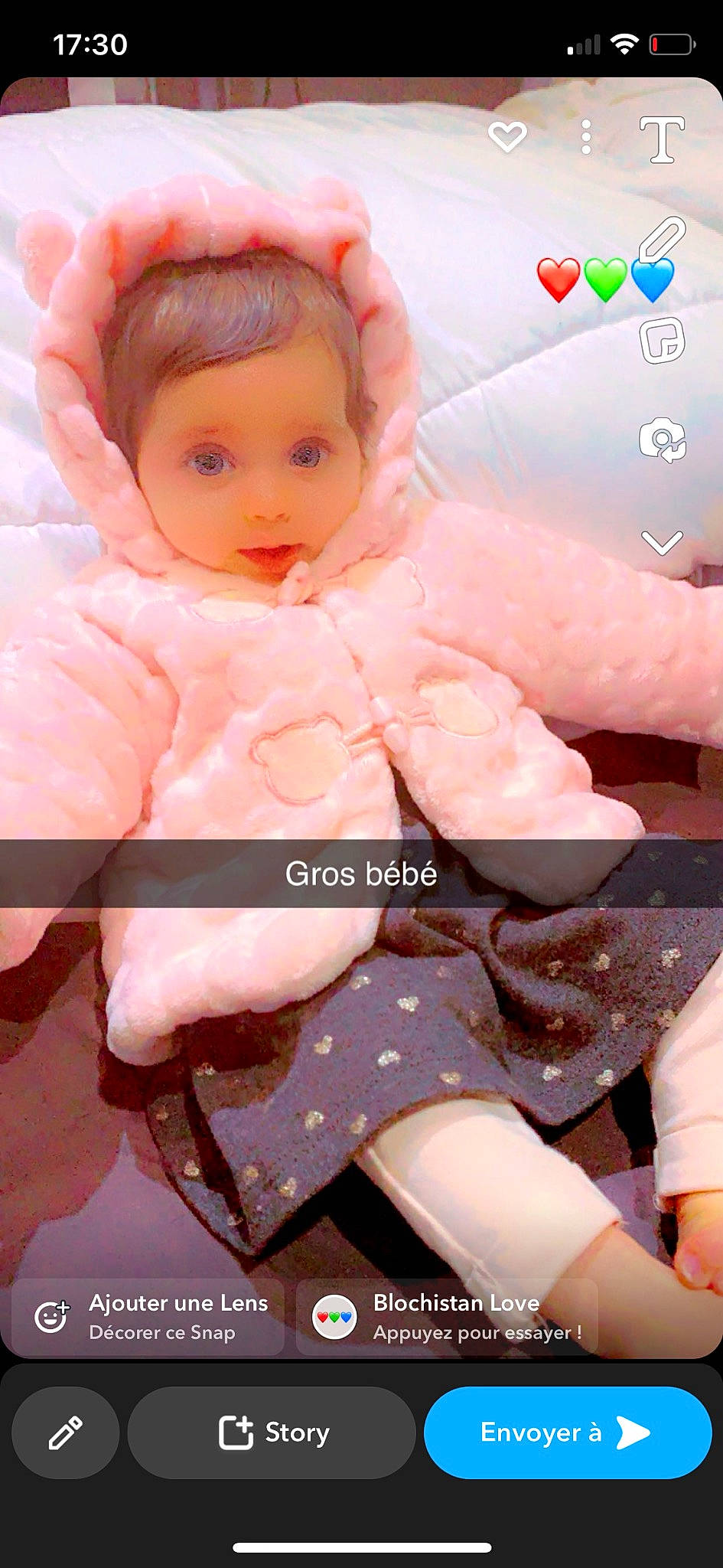 Thyana participe au concours pour gagner de l'argent avec cette photo : baby_toddler_clothing, cheek, child, doll, font, gesture, happy, head, lip, magenta, pattern, peach, person, pink, plastic, sitting, skin, sleeve, thigh, toy