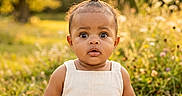 Carebear joined the competition — help win amazing prizes! baby, blanket, child, curious, cute, daylight, expression, field, grass, greenery, infant, nature, outdoor, person, portrait, sitting, summer, sunlight, topknot, young