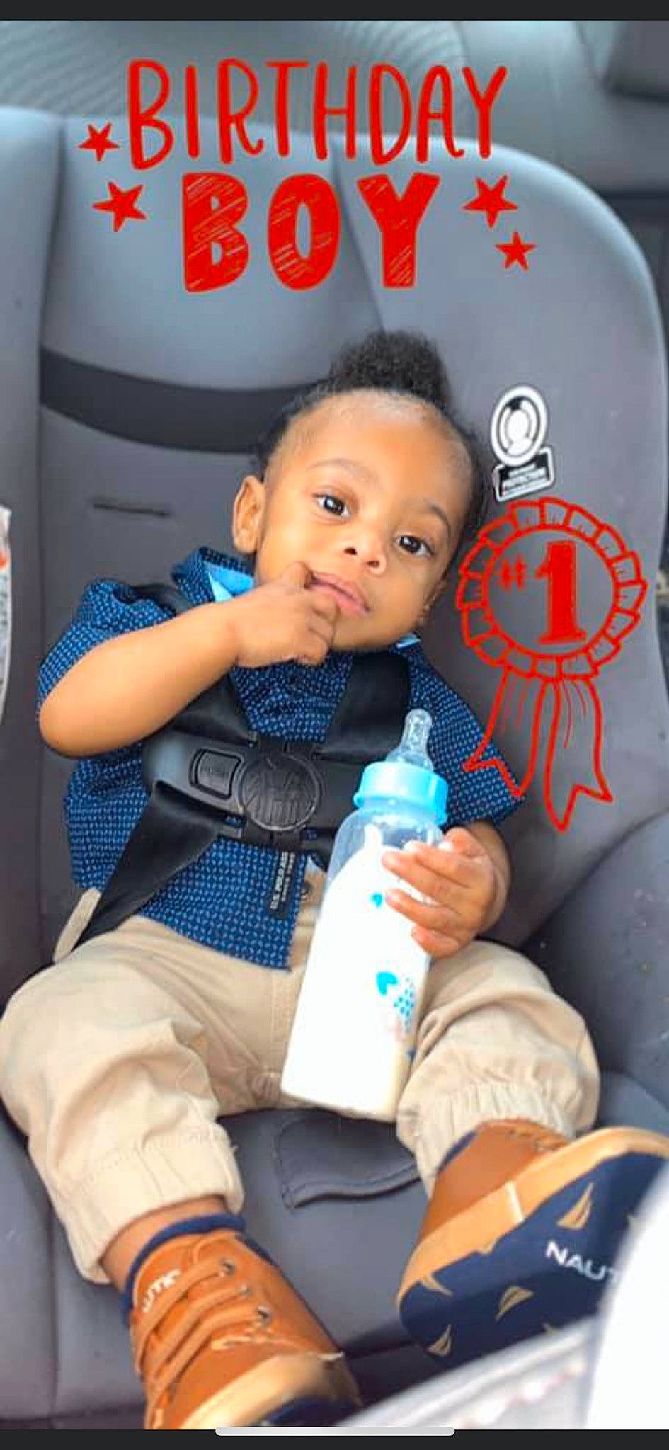 Semaj is registered to the contest to win money with this photo: baby, baby_in_car_seat, baby_products, bottle, car_seat, child, drink, person, product, sitting, toddler