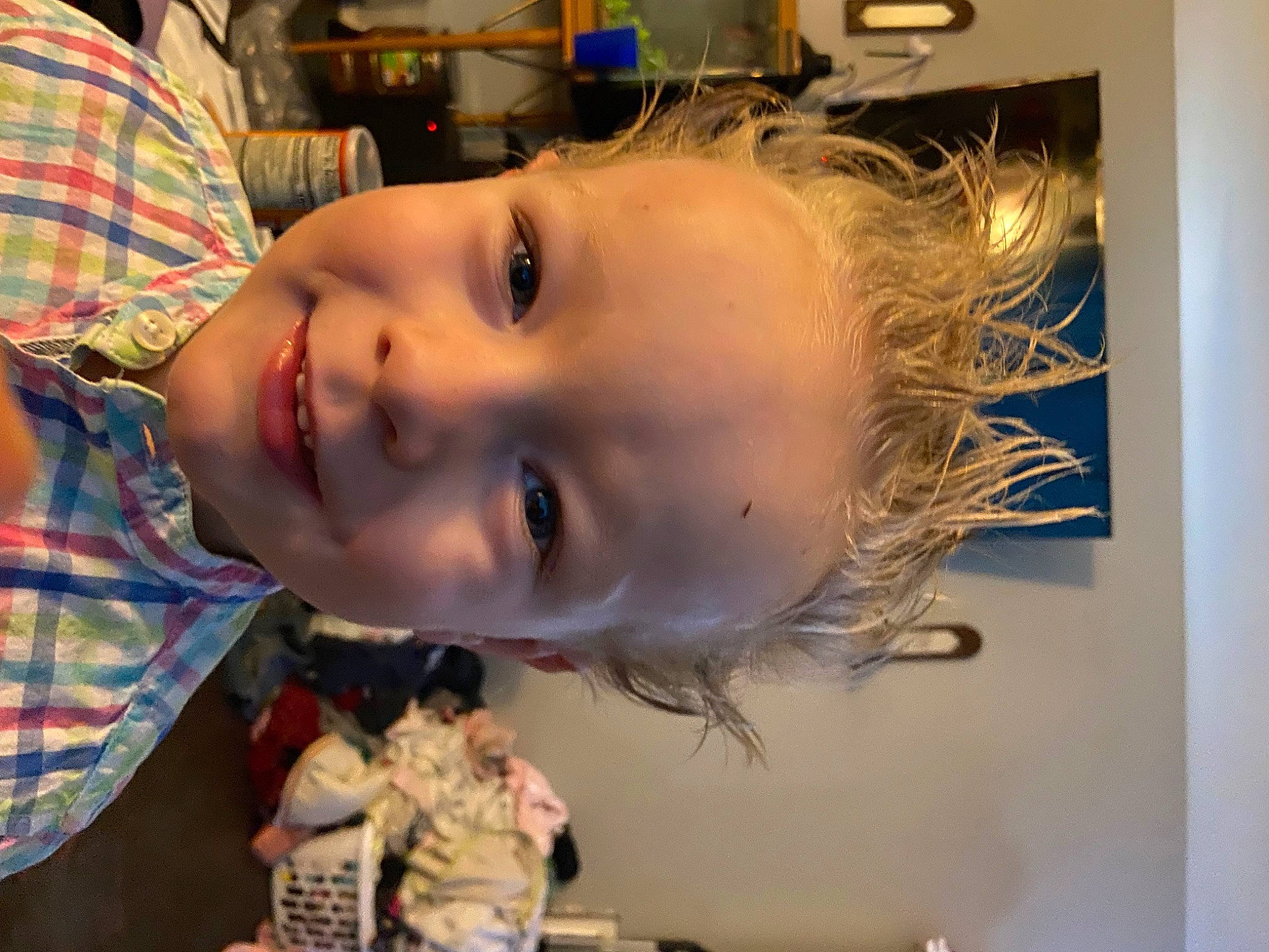 Storm is registered to the contest to win money with this photo: cheek, child, chin, ear, eyelash, facial_expression, forehead, fun, happy, iris, jaw, joy, lip, mouth, neck, nose, person, plaid, skin, smile