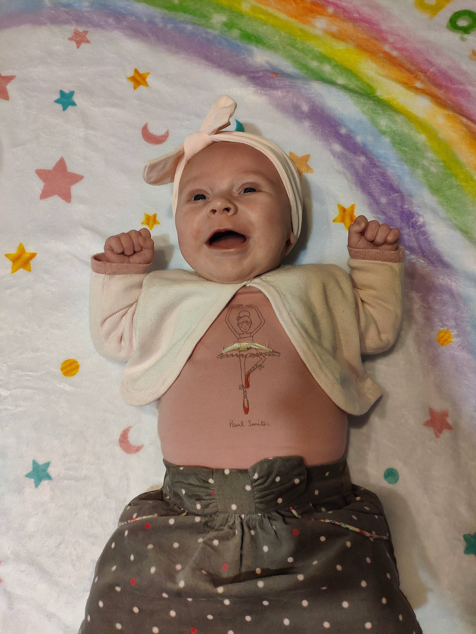 Joelynn a rejoint le concours — aidez-le/la à gagner de superbes lots ! art, baby, baby_toddler_clothing, child, design, eye, happy, headwear, pattern, people_in_nature, person, photograph, pink, product, rainbow, skin, smile, textile, toddler, waist