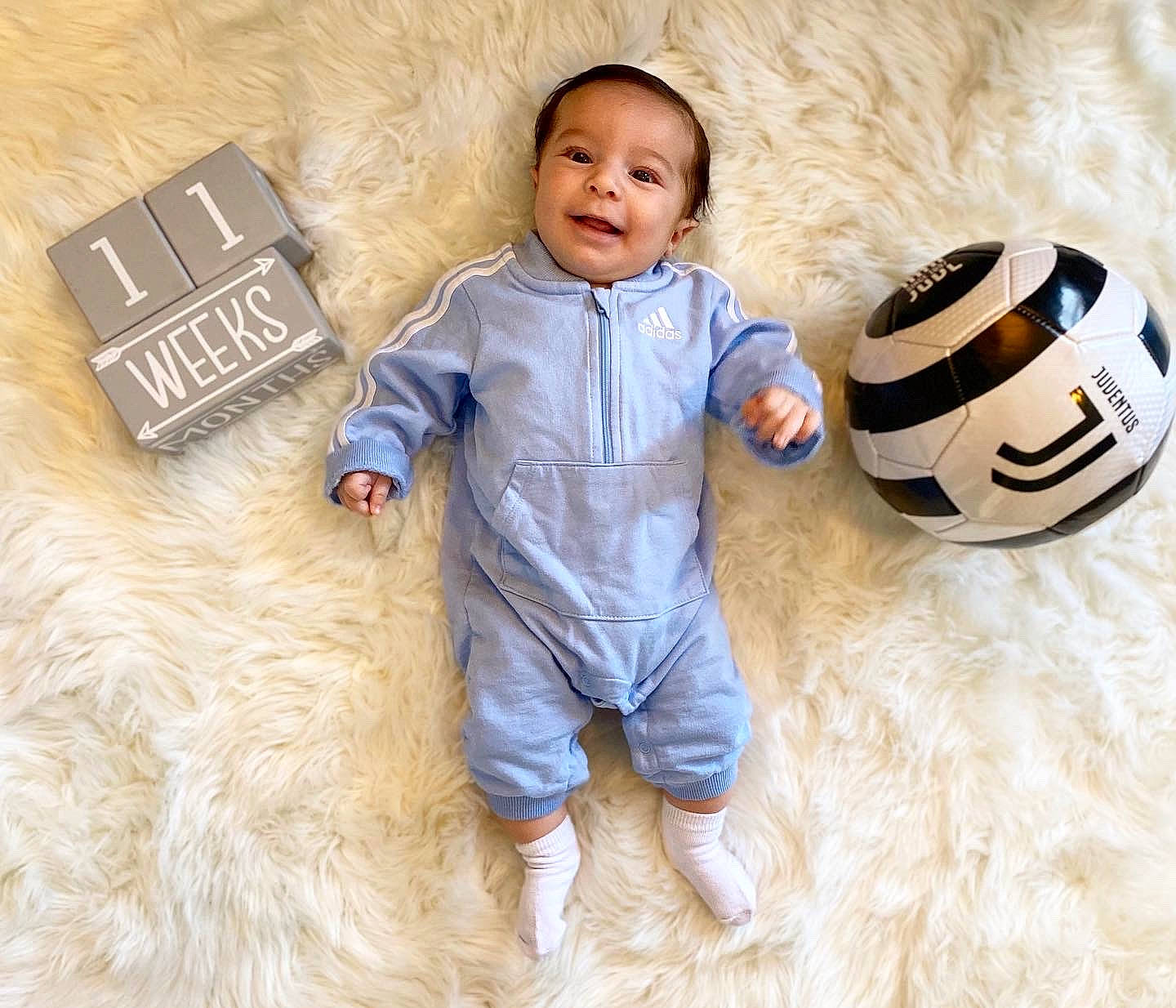 Alessio joined the competition — help win amazing prizes! baby, baby_toddler_clothing, ball, child, football, outerwear, person, play, sleeve, soccer_ball, t_shirt, toddler
