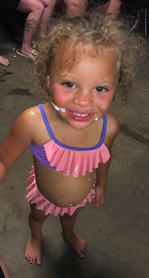 Saniyah is registered to the contest to win money with this photo: baby_toddler_clothing, cheek, chest, child, facial_expression, fun, grass, hair, happy, iris, joy, leg, lip, mouth, neck, person, pink, skin, smile, summer