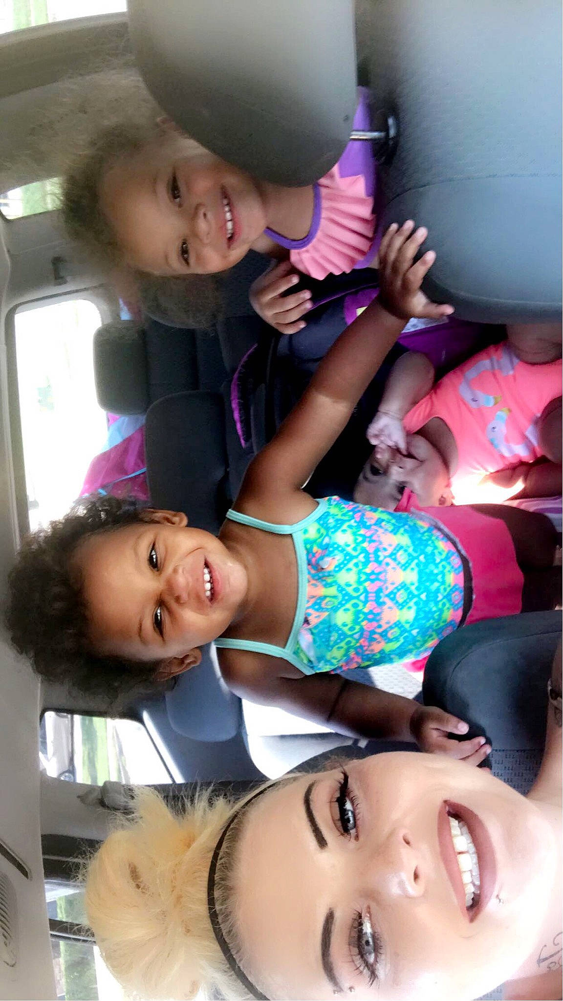 Iyanah is registered to the contest to win money with this photo: black, black_hair, cheek, eyelash, face, facial_expression, finger, fun, gesture, happy, headwear, joy, mouth, muscle, organ, people, person, photograph, pink, purple