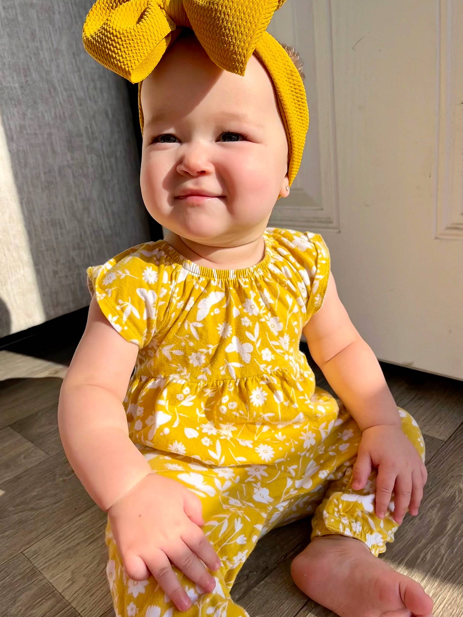 Wren is registered to the contest to win money with this photo: baby, baby_toddler_clothing, cap, child, costume_hat, embellishment, face, fashion_accessory, fun, happy, head, headwear, magenta, pattern, peach, person, photograph, skin, sleeve, smile