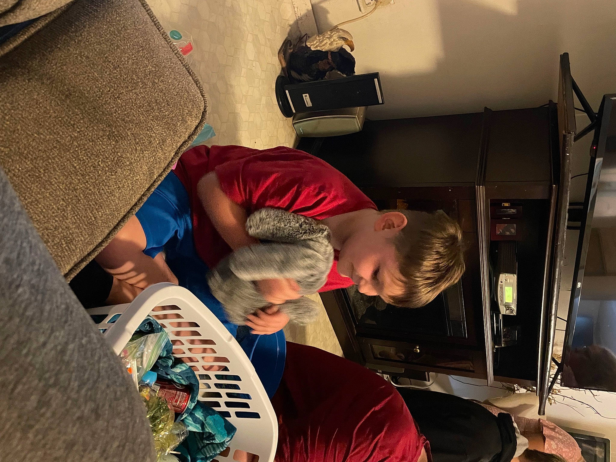 Jordyn is registered to the contest to win money with this photo: artist, audio_equipment, bag, comfort, engineering, eyewear, fun, machine, pattern, person, room, sitting, t_shirt, visual_arts