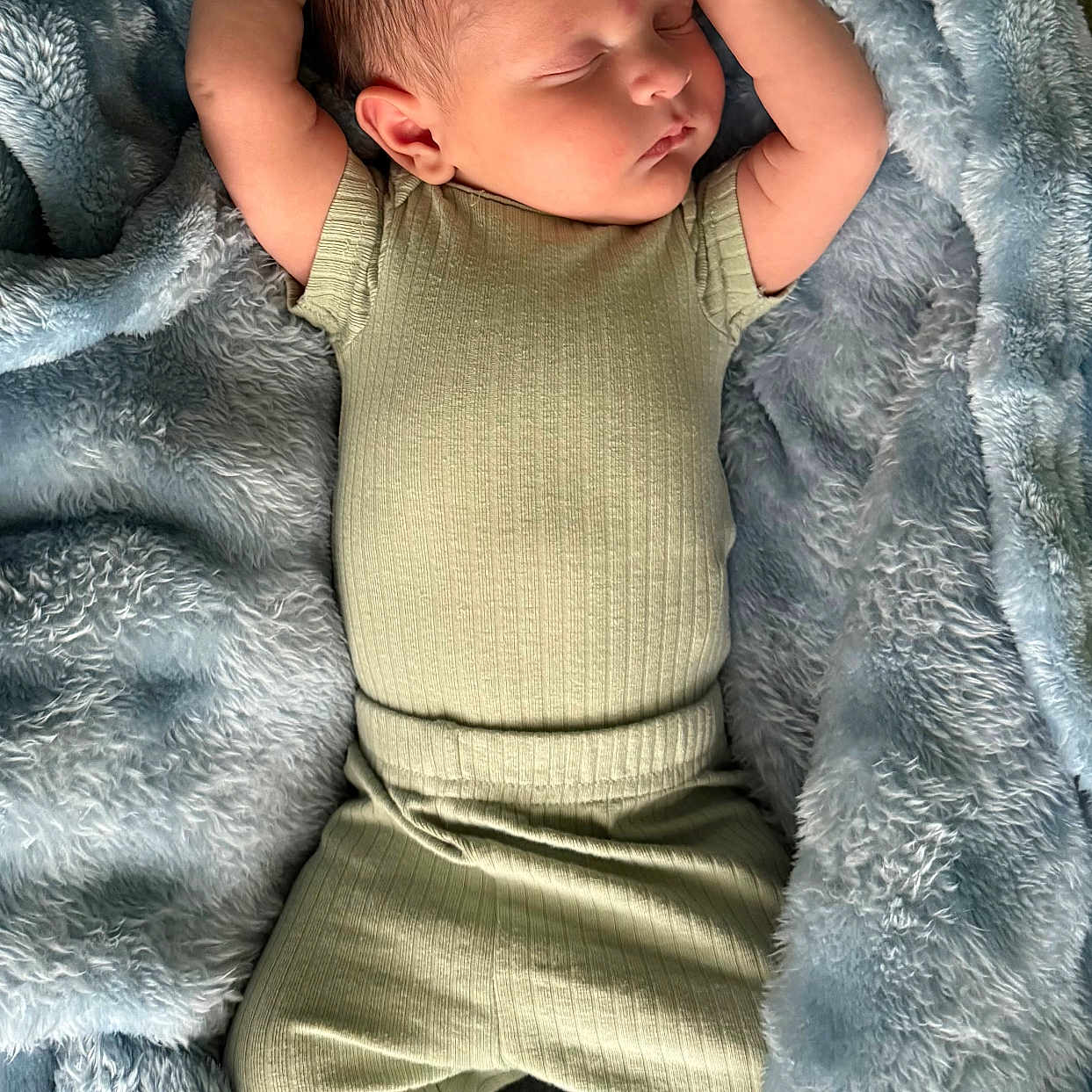 Zion joined the competition — help win amazing prizes! baby, blanket, blue, child, comfort, cozy, cute, green, hands_up, indoors, infant, newborn, pajamas, peaceful, portrait, resting, sleeping, soft, toddler, warm