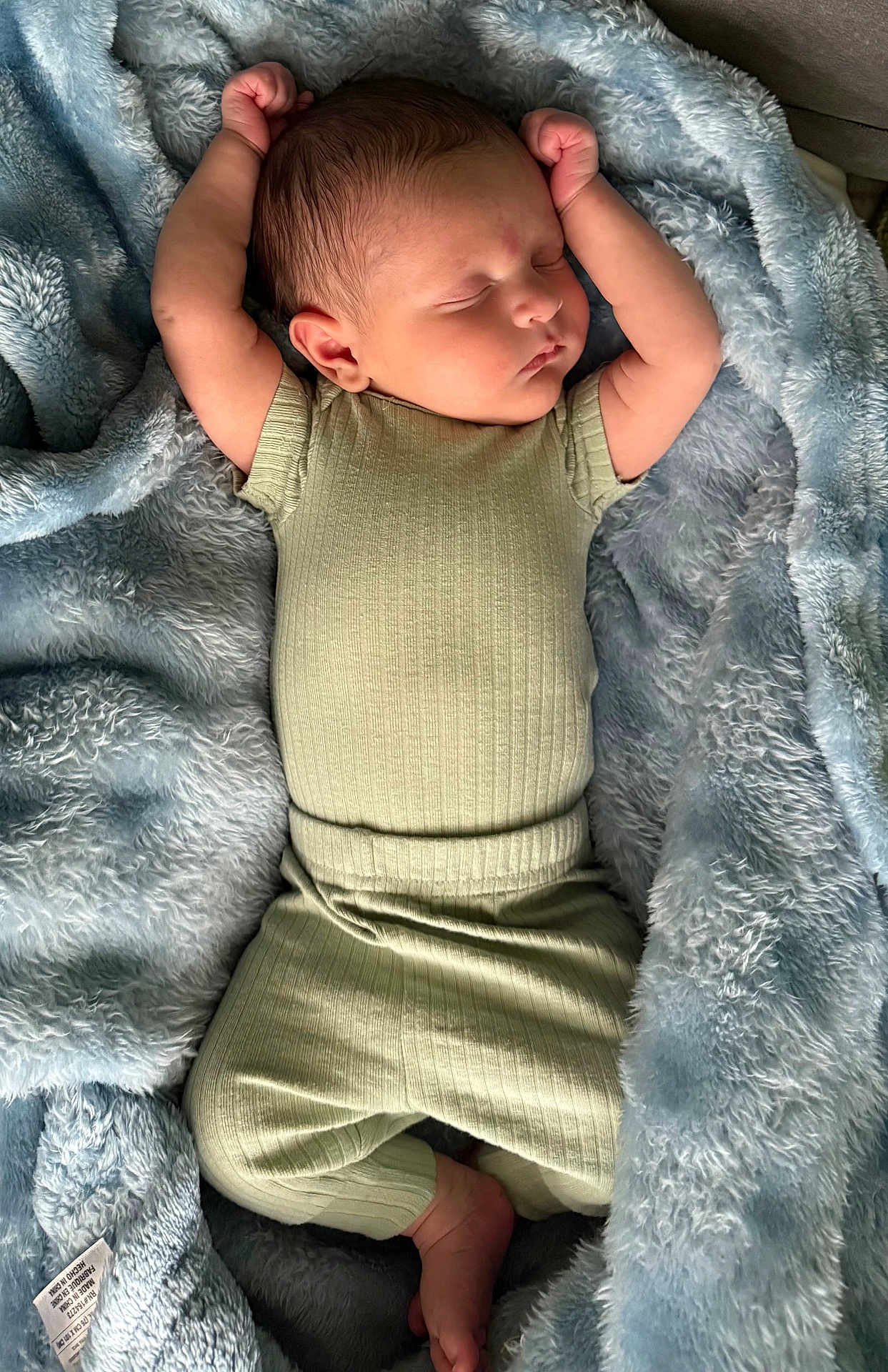 Zion joined the competition — help win amazing prizes! baby, blanket, blue, child, comfort, cozy, cute, green, hands_up, indoors, infant, newborn, pajamas, peaceful, portrait, resting, sleeping, soft, toddler, warm