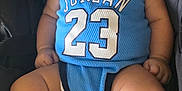 Juan joined the competition — help win amazing prizes! baby, infant, sleeping, car_seat, blue_clothing, nike, jordan, socks, hat, child, cute, indoors, relaxed, sporty, apparel, footwear, headwear, young_child, seated, peaceful
