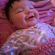 Luna joined the competition — help win amazing prizes! baby, bed, bedroom, blanket, cushion, face, furniture, happy, head, homedecor, indoors, newborn, person, photography, portrait, purple, quilt, room, sleeping, smile