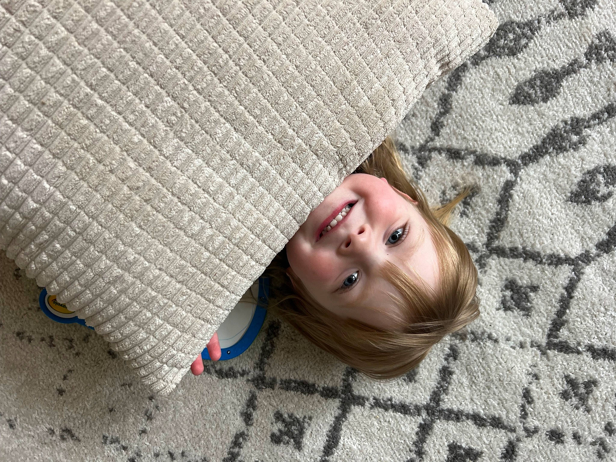 Amelia joined the competition — help win amazing prizes! cheek, child, circle, comfort, concrete, eye, floor, flooring, fun, grass, grey, happy, joy, linens, pattern, person, portrait_photography, road_surface, smile, textile