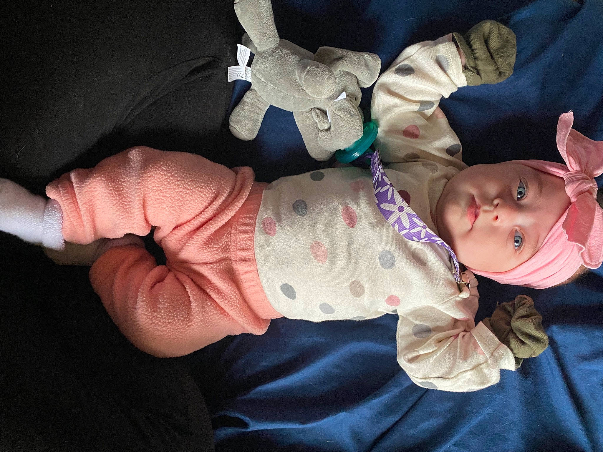 Iyla is registered to the contest to win money with this photo: baby, baby_carriage, baby_products, baby_toddler_clothing, cheek, child, comfort, finger, foot, gesture, glasses, hand, headwear, human_leg, lap, person, sitting, skin, sleeve, thumb