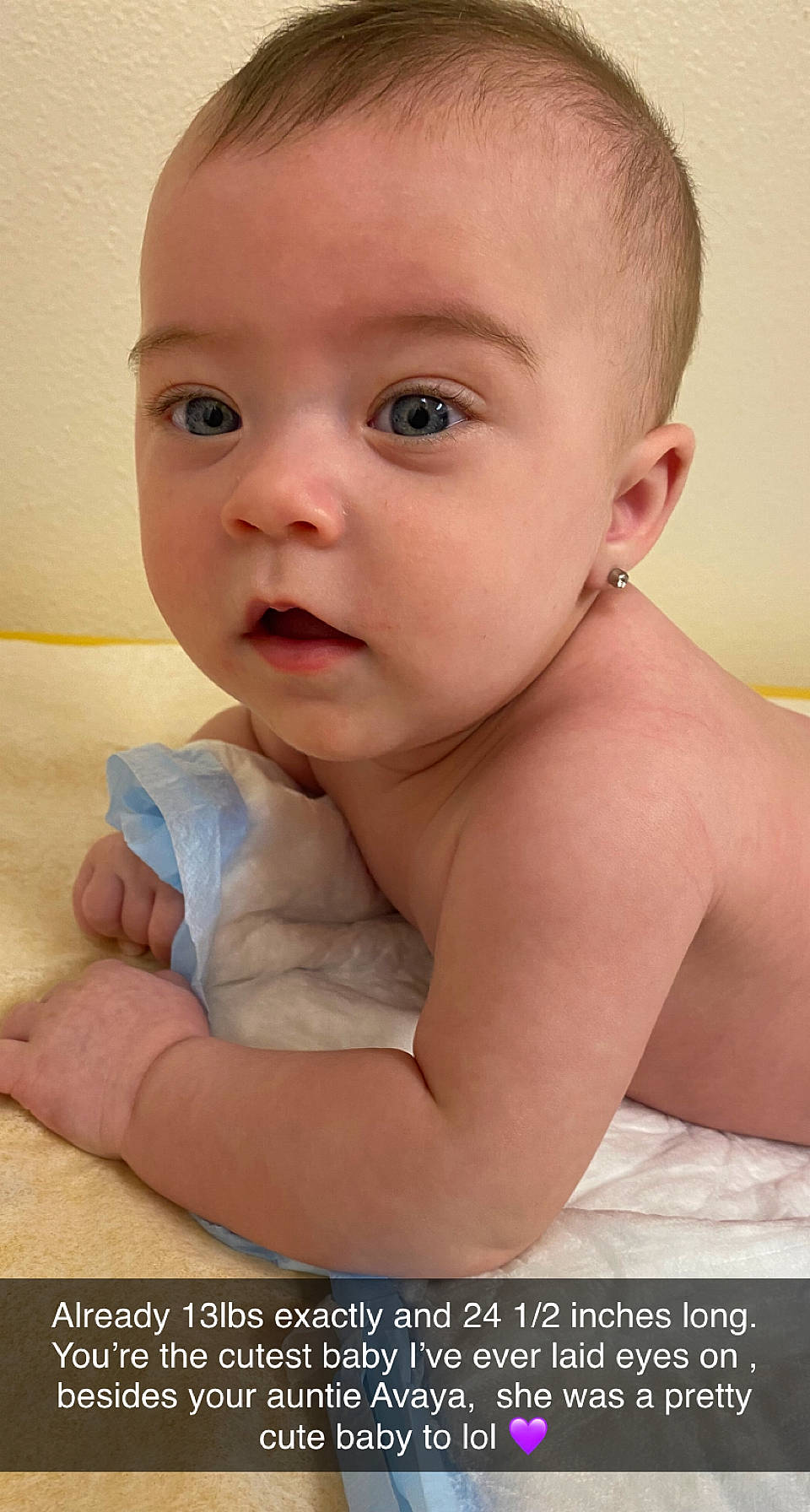 Iyla is registered to the contest to win money with this photo: baby, baby_toddler_clothing, cheek, chest, child, comfort, eye, eyelash, flash_photography, gesture, happy, iris, lip, neck, nose, person, portrait_photography, sitting, skin, surprise