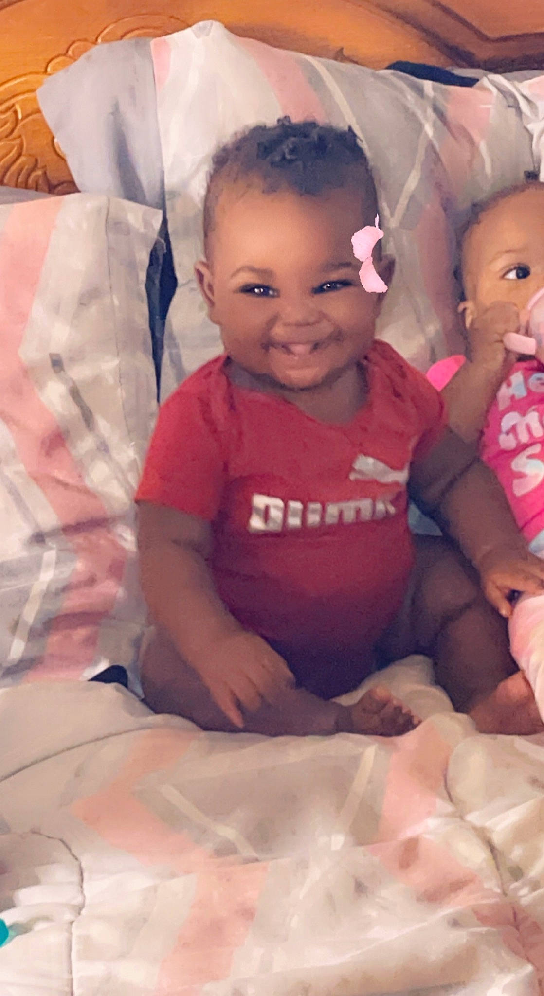 Malaysia is registered to the contest to win money with this photo: cheek, comfort, eye, eyebrow, face, facial_expression, finger, happy, human, human_body, joy, lip, mouth, neck, nose, person, pink, skin, sleeve, smile