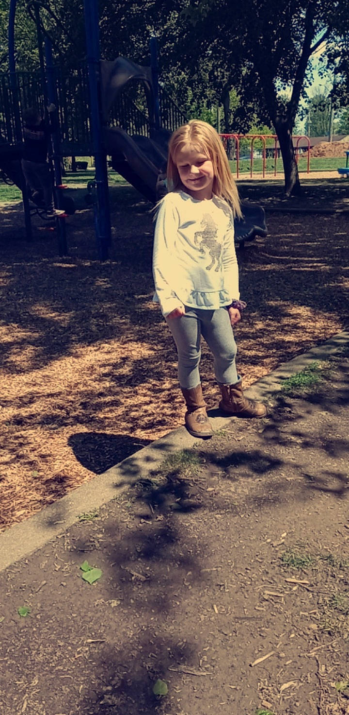 Aviah is registered to the contest to win money with this photo: branch, cool, fun, grass, hair, hairstyle, happy, joy, leaf, leg, leisure, long_hair, people_in_nature, person, plant, recreation, smile, tints_and_shades, tree, trunk