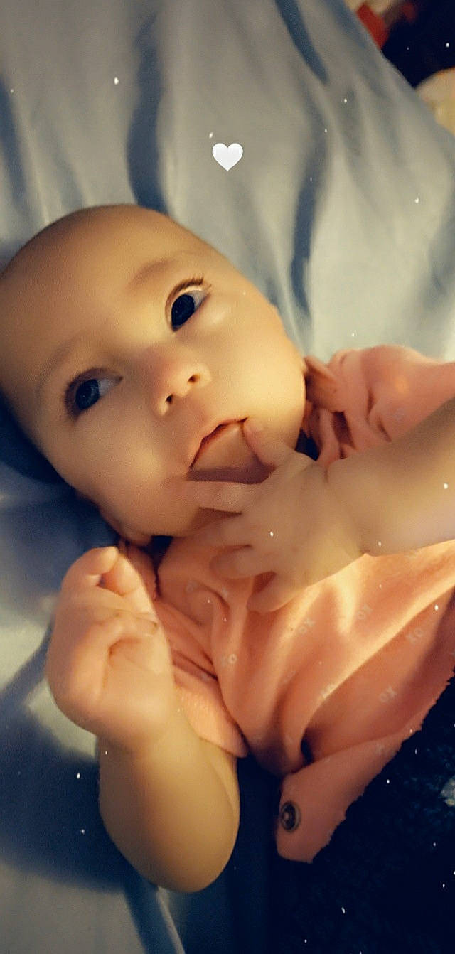 Victoria is registered to the contest to win money with this photo: baby, cheek, chest, chin, eye, eyebrow, eyelash, finger, gesture, head, human_body, jaw, leg, lip, mouth, nail, nose, person, skin, thumb