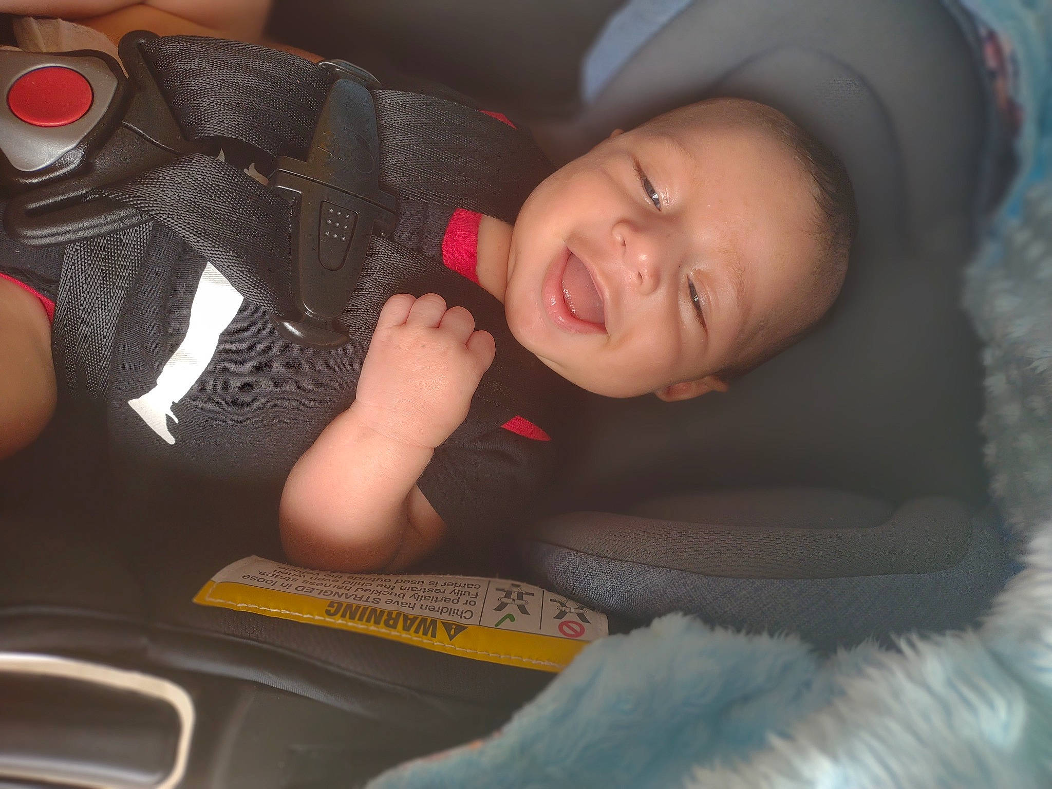 Zander joined the competition — help win amazing prizes! audio_equipment, auto_part, baby, car_seat, comfort, face, finger, flash_photography, fun, gadget, linens, mouth, nail, nose, person, sitting, skin, smile, thumb, toddler