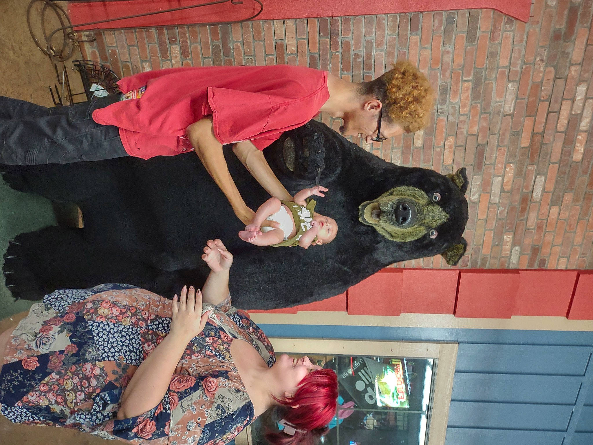 Zander is registered to the contest to win money with this photo: arm, balance, elbow, event, fun, gesture, happy, human_leg, joint, joy, knee, leisure, pattern, person, room, sandal, smile, thigh, trunk, waist