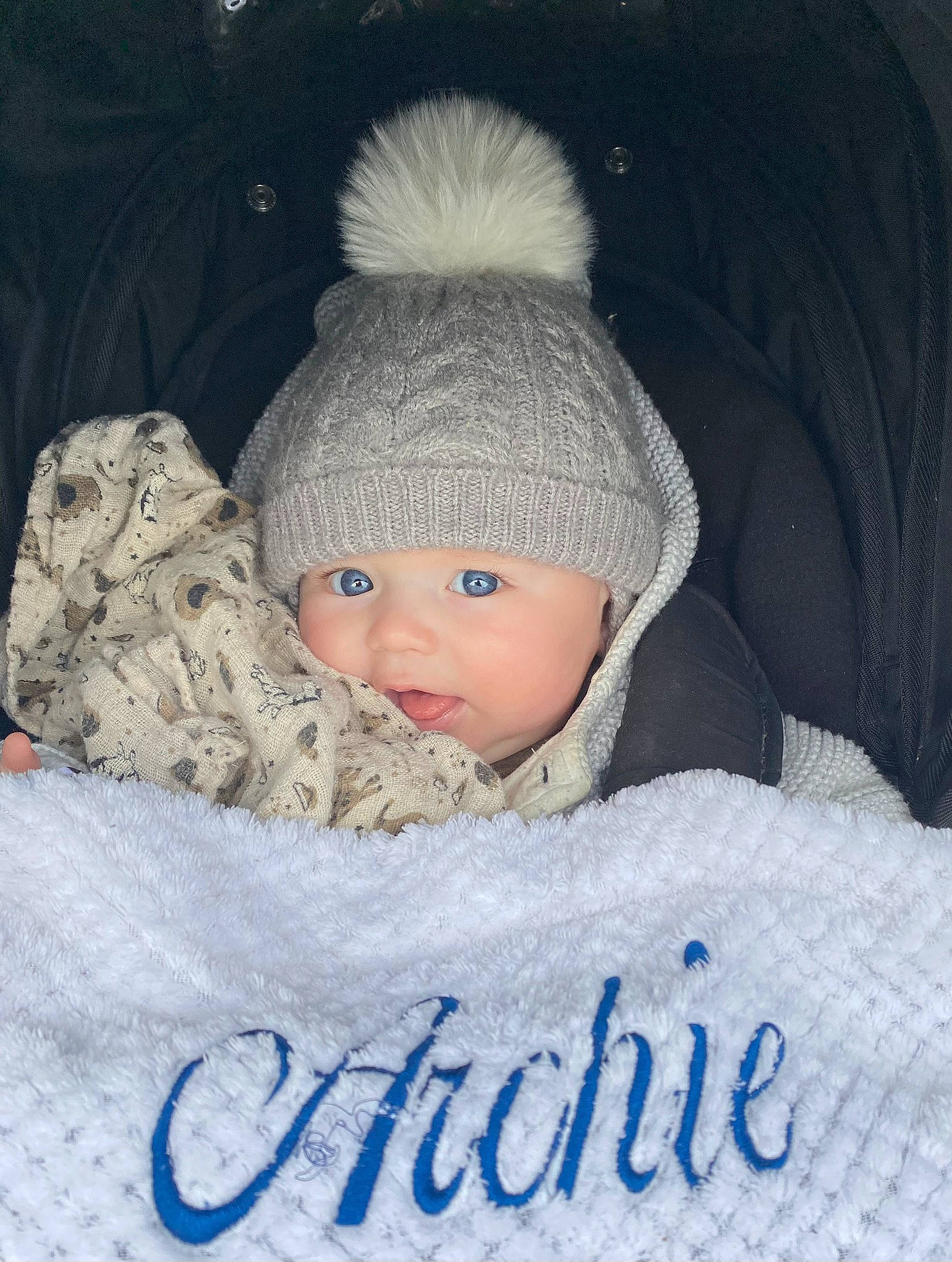 Archie joined the competition — help win amazing prizes! baby, baby_sleeping, baby_toddler_clothing, beanie, cap, cheek, child, comfort, face, freezing, fur, head, headwear, knit_cap, linens, person, sleeve, textile, toddler, winter
