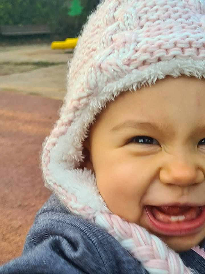 Lysana participe au concours pour gagner de l'argent avec cette photo : baby, cap, cheek, child, chin, close_up, eye, eyebrow, face, fun, happy, headwear, iris, lip, nose, outerwear, person, photograph, skin, smile