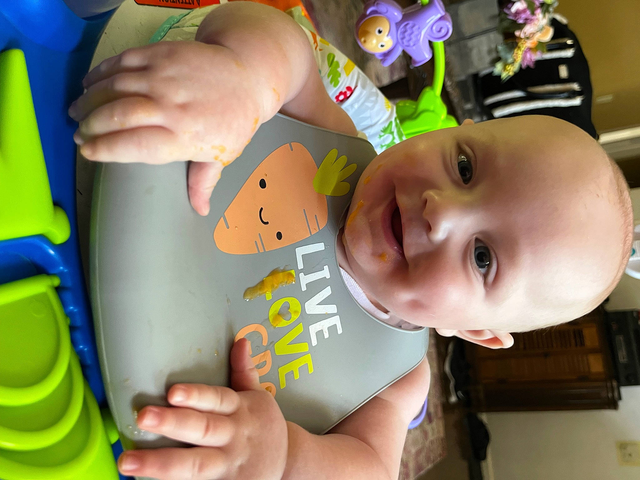 Nikolai is registered to the contest to win money with this photo: baby, blue, cheek, child, facial_expression, finger, fun, green, hand, happy, joy, leisure, nail, person, photograph, room, skin, smile, snapshot, thumb