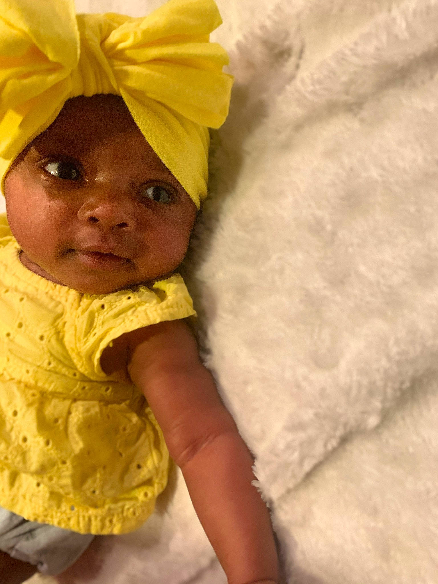Amor is registered to the contest to win money with this photo: baby, bonnet, child, headgear, headwear, person, skin, smile, toddler, yellow