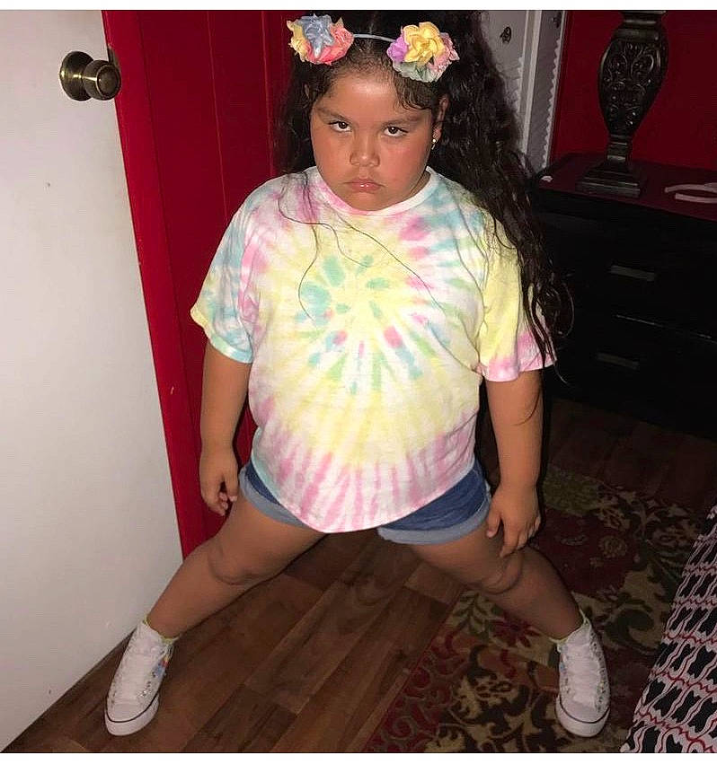 Carolina joined the competition — help win amazing prizes! bangs, beauty, black_hair, dress, eye, eyelash, face, happy, head, headpiece, jewellery, knee, long_hair, necklace, person, pink, shoe, t_shirt, thigh, trunk