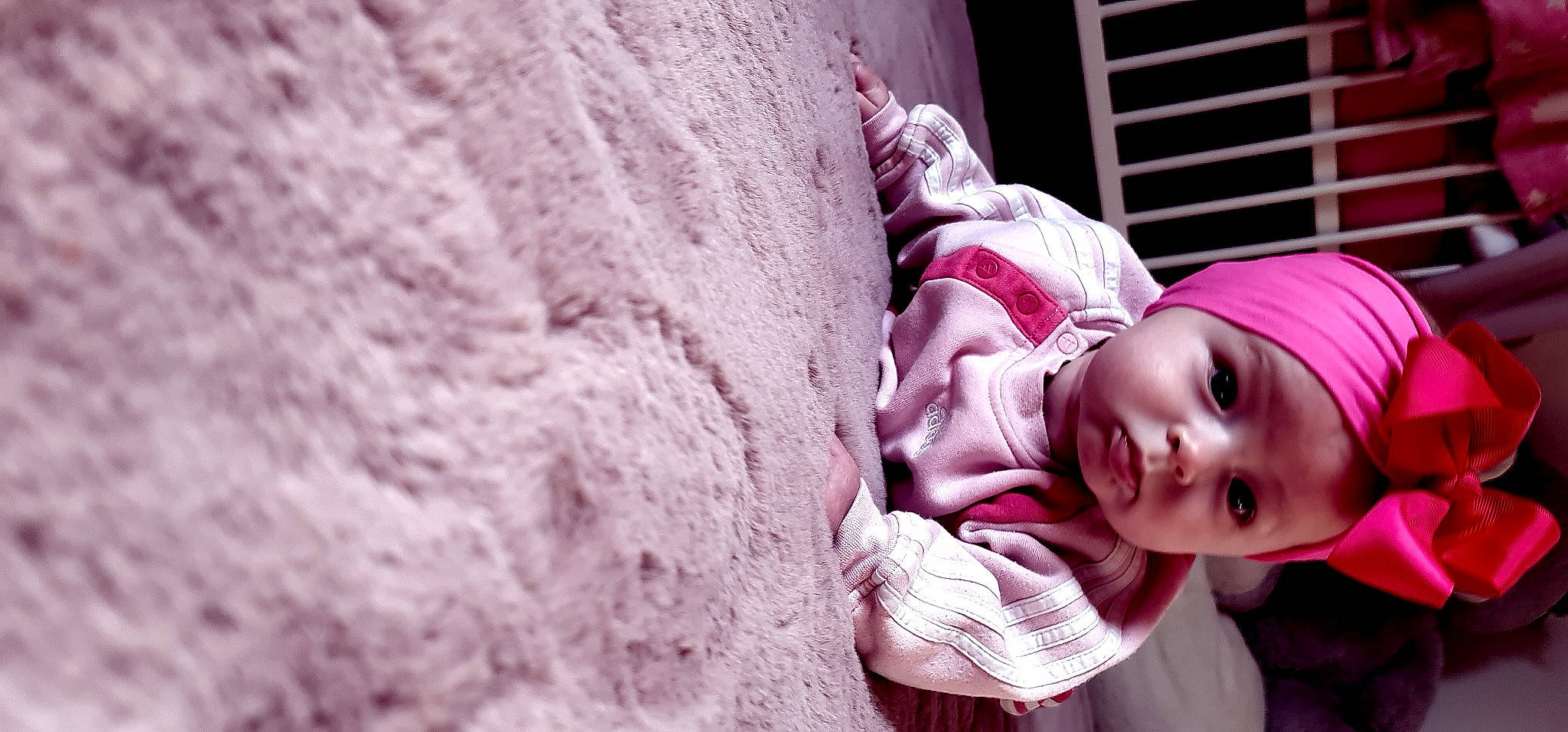 Henneah participe au concours pour gagner de l'argent avec cette photo : baby, child, fun, fur, grass, happy, headwear, linens, lip, magenta, nap, person, photo_shoot, pink, portrait_photography, purple, sitting, smile, toddler, tree