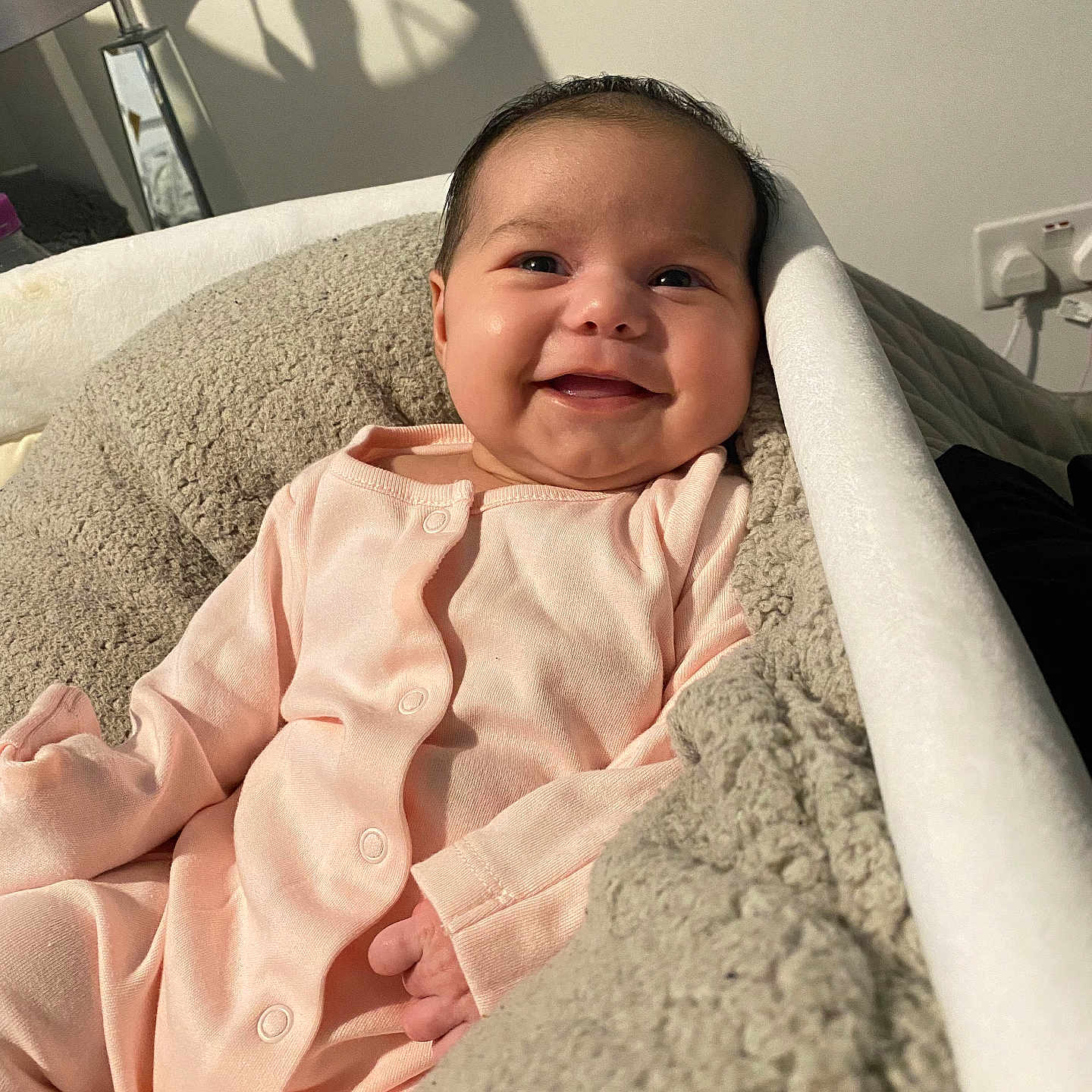 Ava is registered to the contest to win money with this photo: baby, babylaughing, bed, bedroom, blanket, crib, cushion, face, furniture, happy, head, homedecor, infantbed, laughing, newborn, person, photography, portrait, quilt, smile