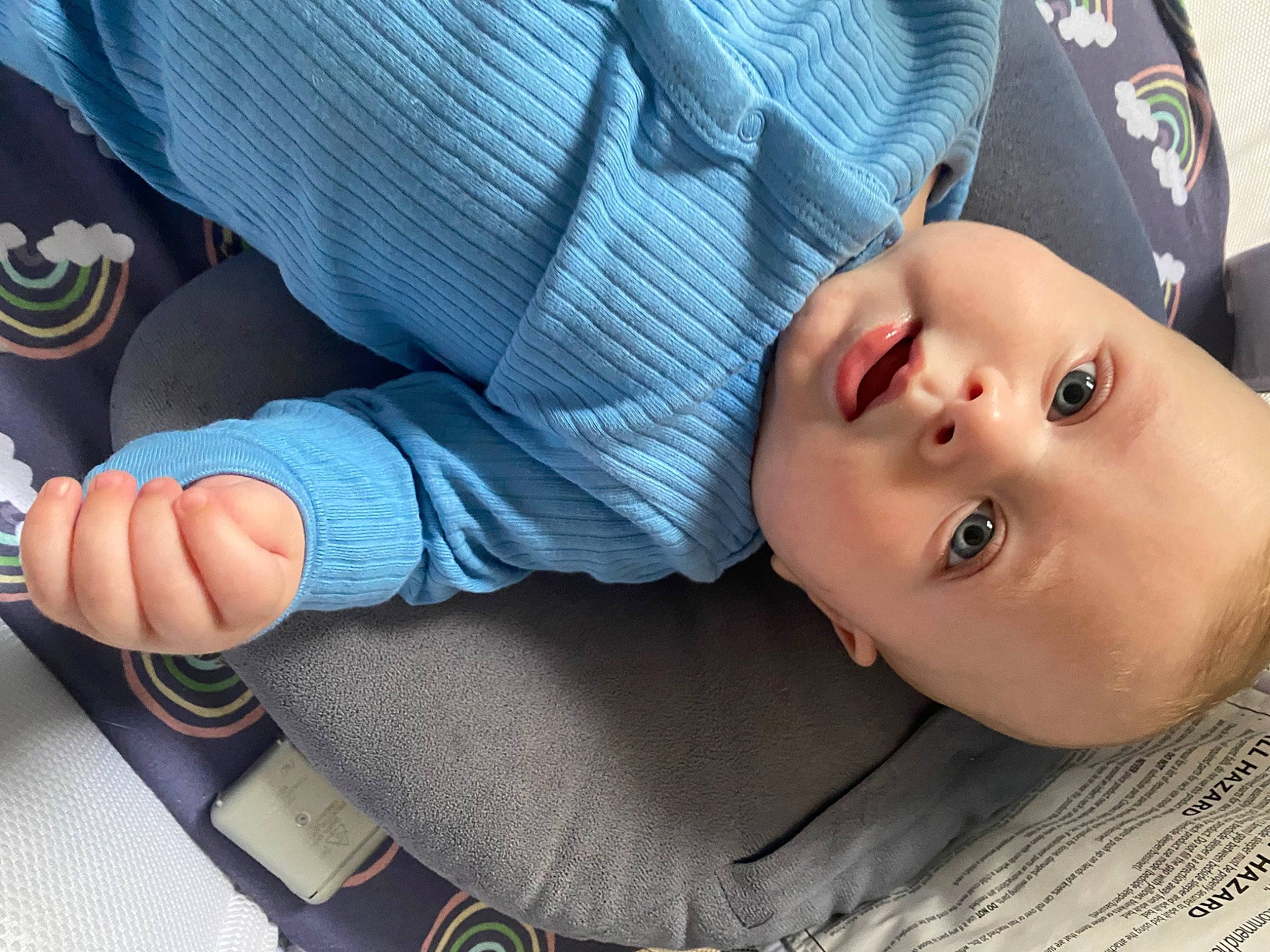 Elliot is registered to the contest to win money with this photo: baby, baby_products, baby_toddler_clothing, cheek, child, comfort, elbow, eyelash, gesture, happy, human_leg, lip, mouth, nail, nose, person, sitting, sleeve, thumb, toddler