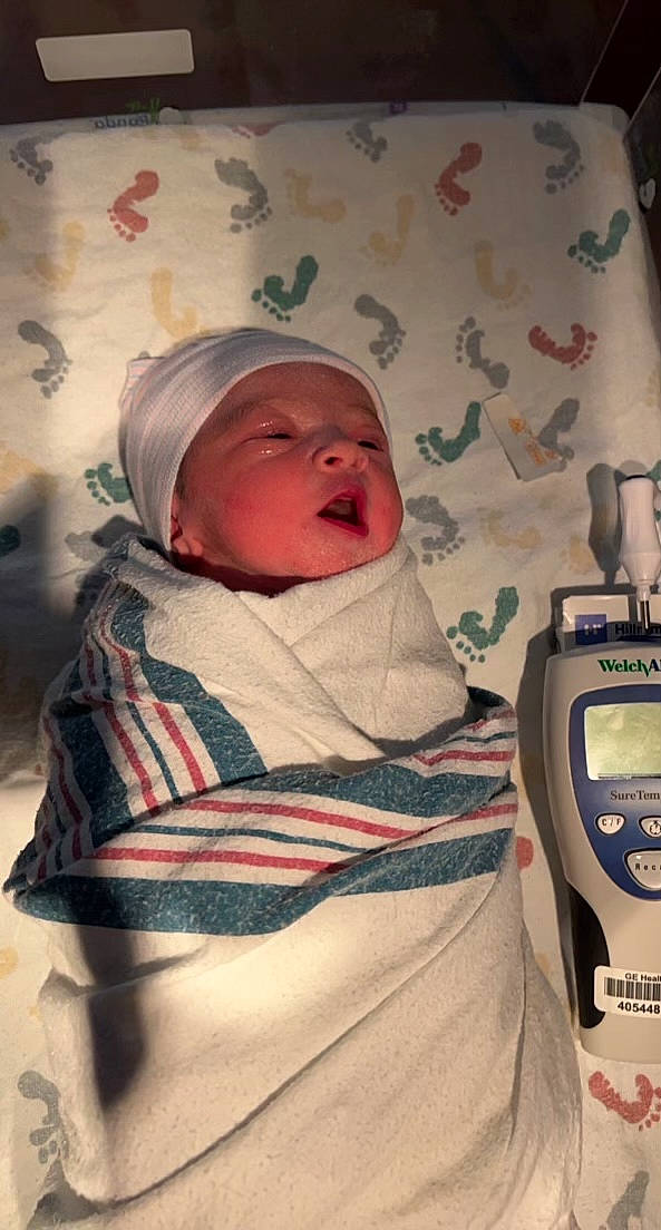 Wrenleigh is registered to the contest to win money with this photo: baby, baby_products, baby_safety, baby_sleeping, baby_toddler_clothing, beanie, cap, cheek, child, comfort, hat, headwear, linens, machine, measuring_instrument, person, product, room, scale, skin