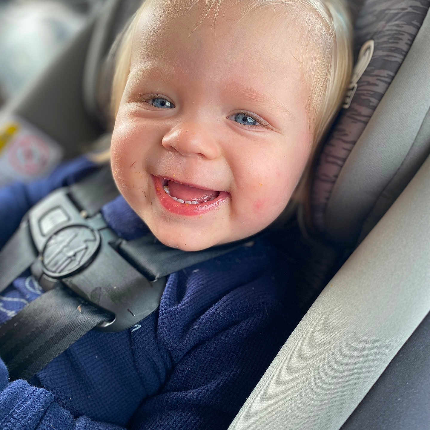 Sebastian joined the competition — help win amazing prizes! accessories, baby, babylaughing, blonde, bodypart, clothing, coat, face, hair, happy, head, jacket, laughing, mouth, person, photography, portrait, smile, strap, teeth