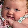 Jaclyn joined the competition — help win amazing prizes! baby, smiling, closeup, face, child, infant, cute, curly_hair, cheeks, hand, blanket, floral_pattern, soft_lighting, portrait, person, happy, indoors, skin, expression, clothing