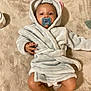Vivienne joined the competition — help win amazing prizes! baby, pacifier, robe, hood, blanket, infant, child, soft_texture, pink_ears, lying_down, cute, small_hands, bare_feet, indoor, comfort, cozy, sleepwear, warm_clothing, relaxed, face