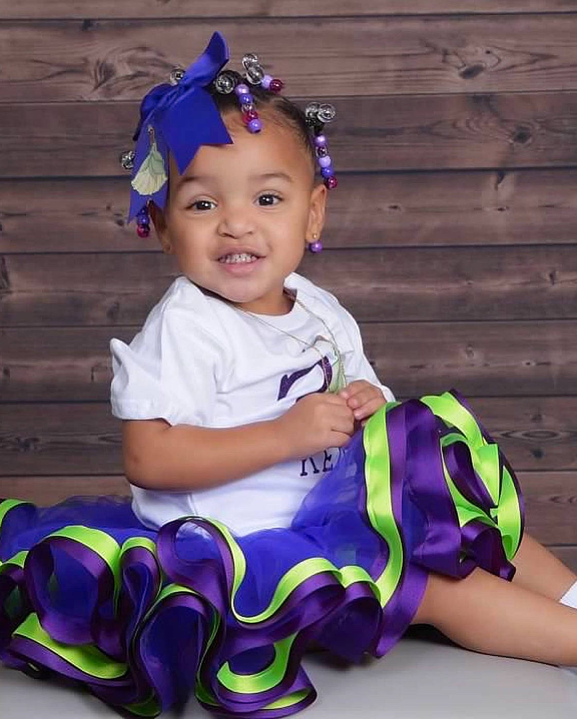 Kennedi is registered to the contest to win money with this photo: baby_toddler_clothing, blue, child, clothing, electric_blue, facial_expression, flash_photography, fun, happy, hat, headband, human, iris, jewellery, joy, person, pink, purple, sleeve, smile