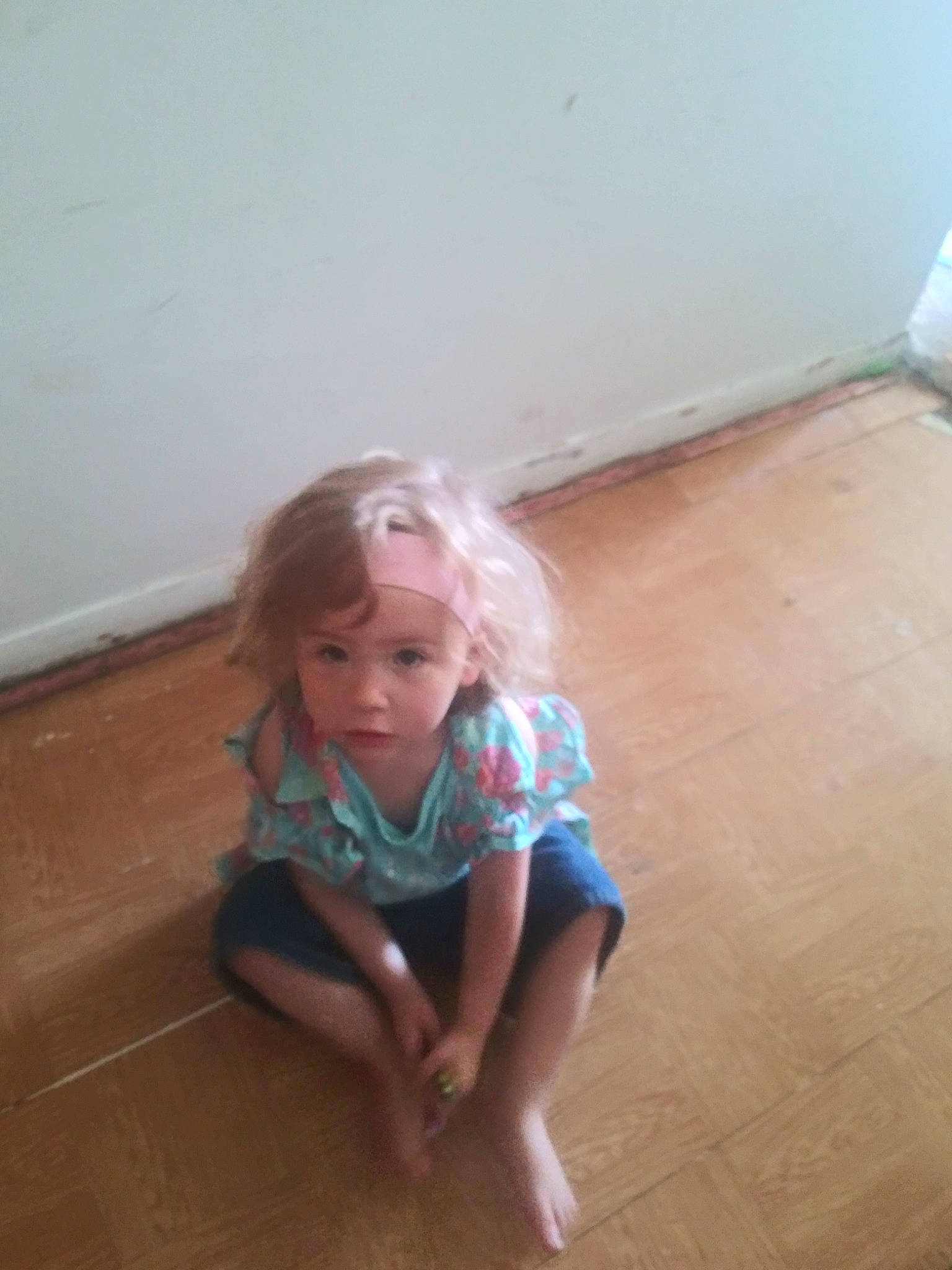 Chloe is registered to the contest to win money with this photo: child, finger, floor, flooring, fun, hardwood, laminate_flooring, leg, person, play, sitting, standing, toddler, wood, wood_flooring
