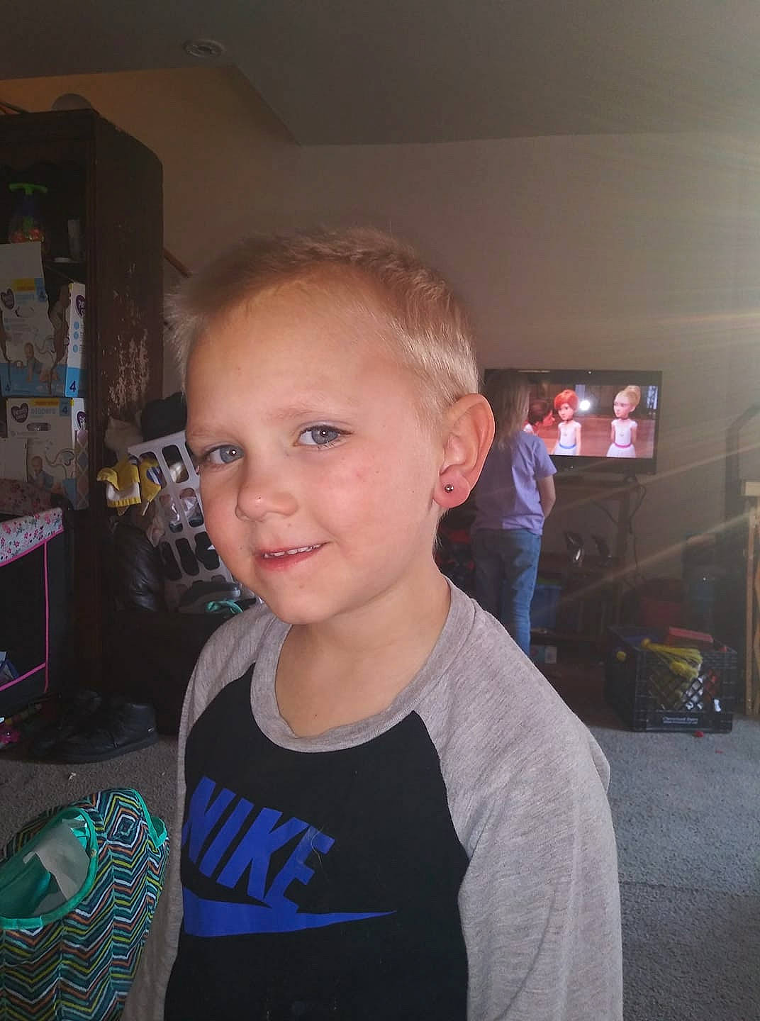 Jeffery is registered to the contest to win money with this photo: child, chin, cool, ear, face, forehead, fun, hair, hairstyle, head, jaw, neck, person, smile, t_shirt, toddler, tooth, vacation