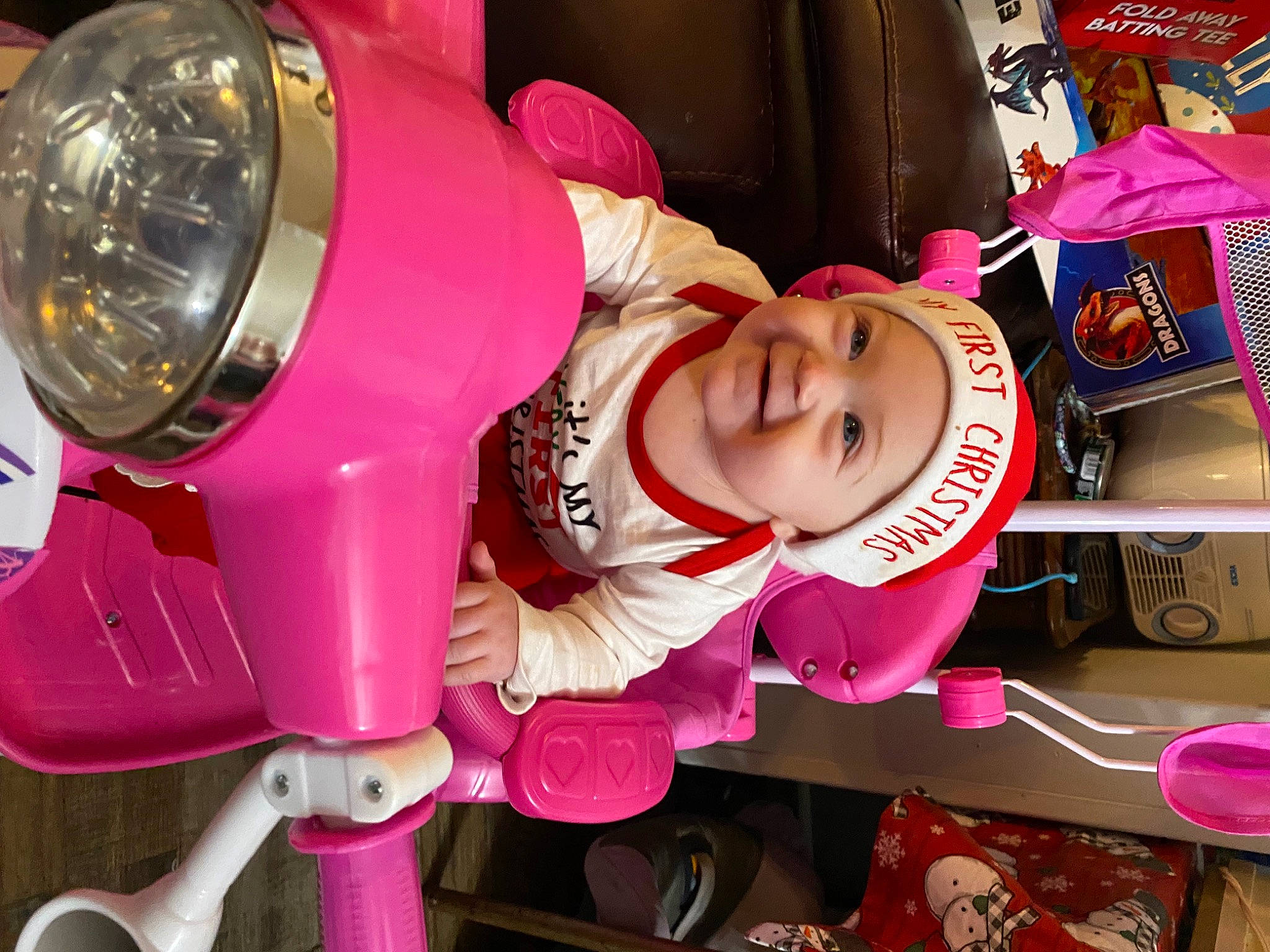 Paisley joined the competition — help win amazing prizes! child, fun, happy, hat, headwear, joy, machine, magenta, person, photography, pink, product, purple, recreation, red, room, smile, snapshot, tire, toddler